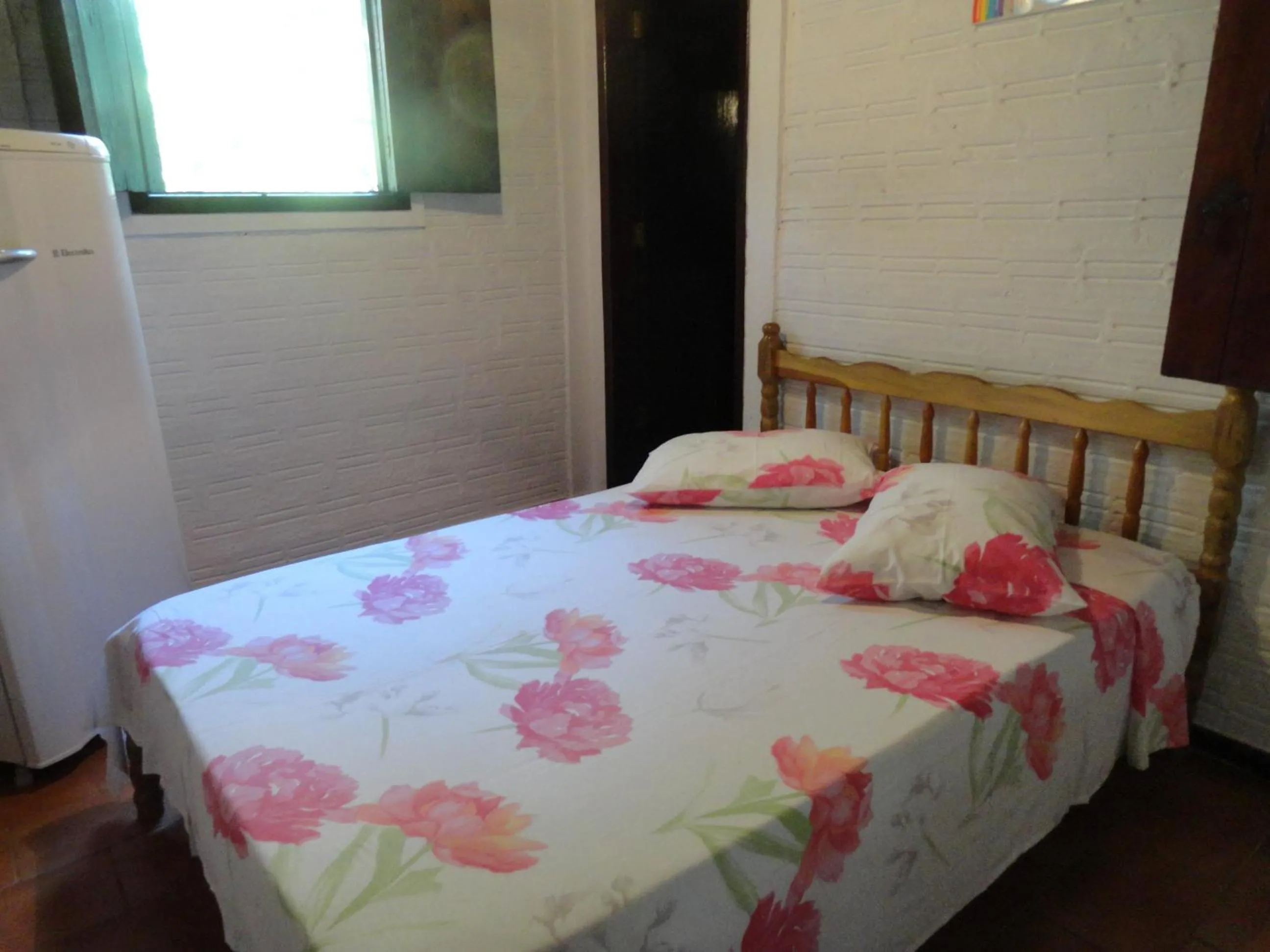 Bed in Ronaldo's Pousada