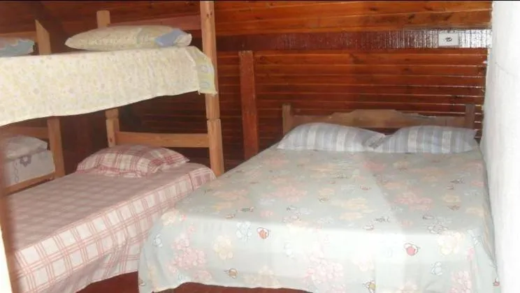 Bed in Ronaldo's Pousada