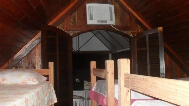 Bed in Ronaldo's Pousada