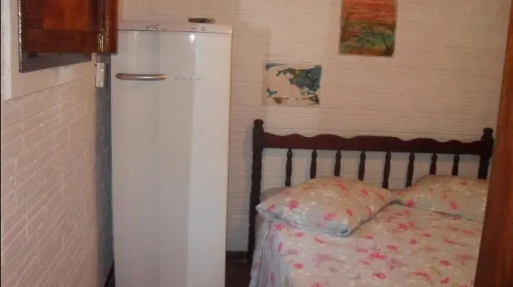 Bed in Ronaldo's Pousada