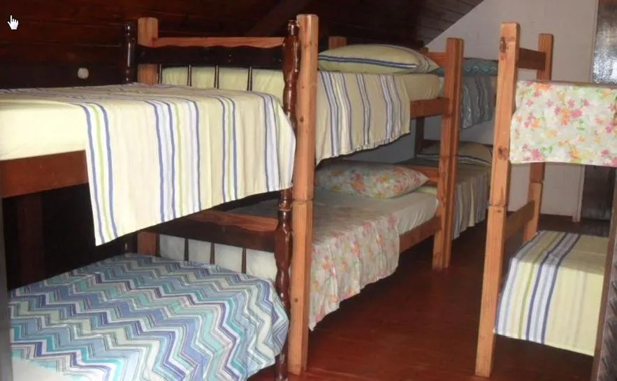 Bed in Ronaldo's Pousada