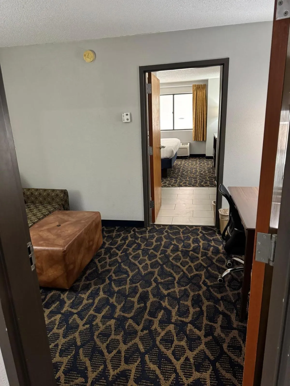 Bed in Greenlight Inn & Suites St James