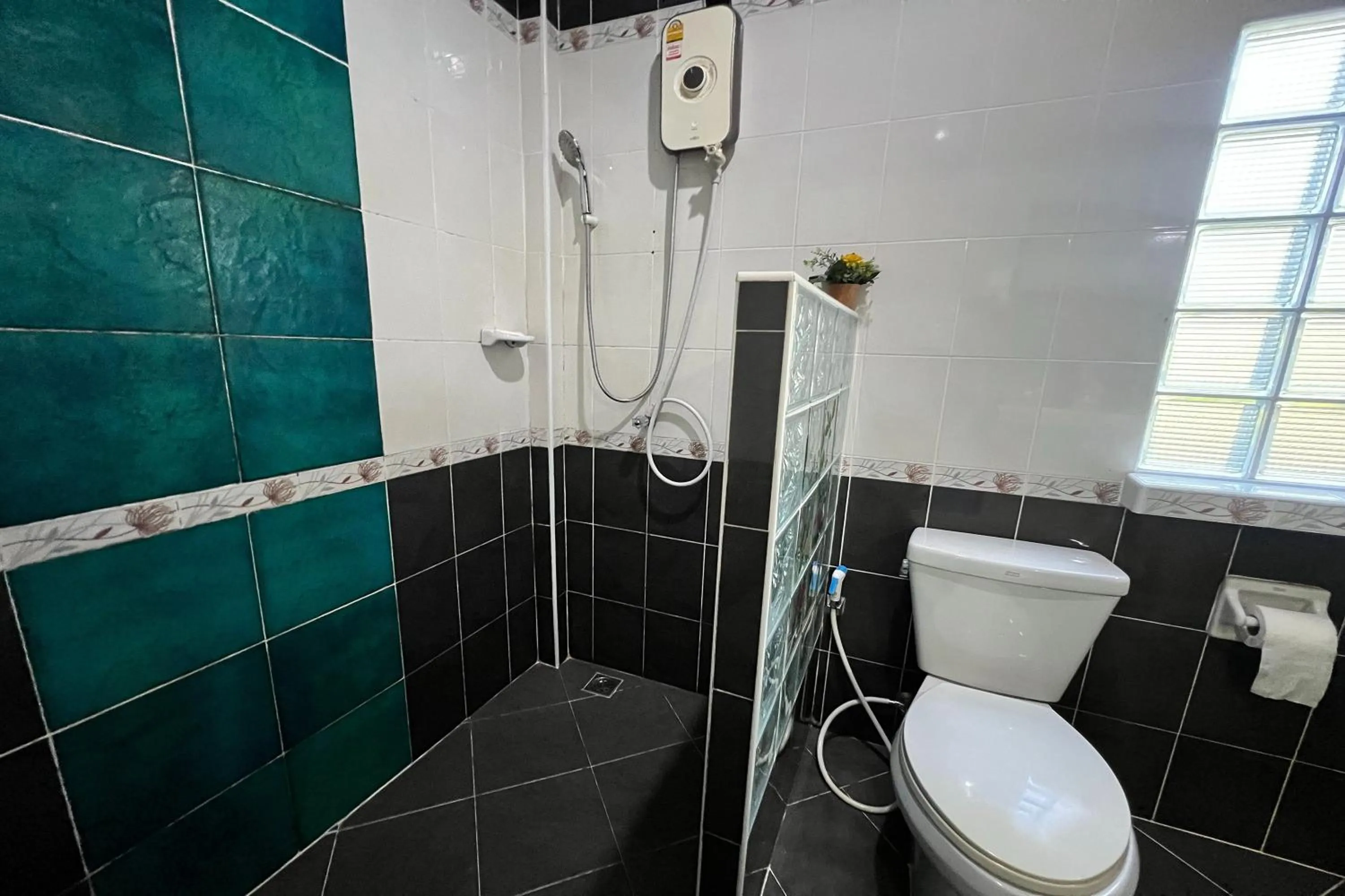 Shower in Saithong Resort