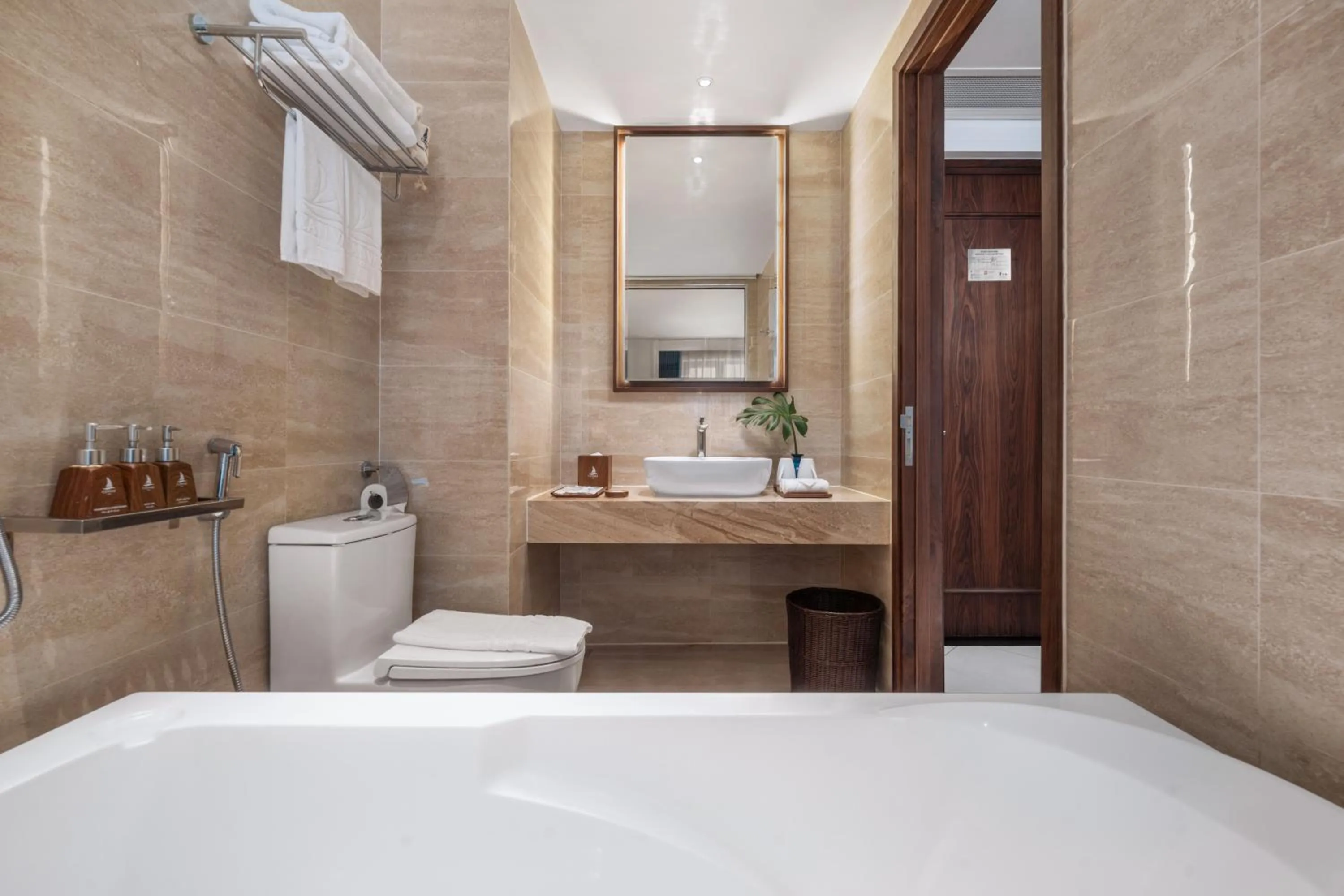 Toilet in Canvas Danang Beach Hotel