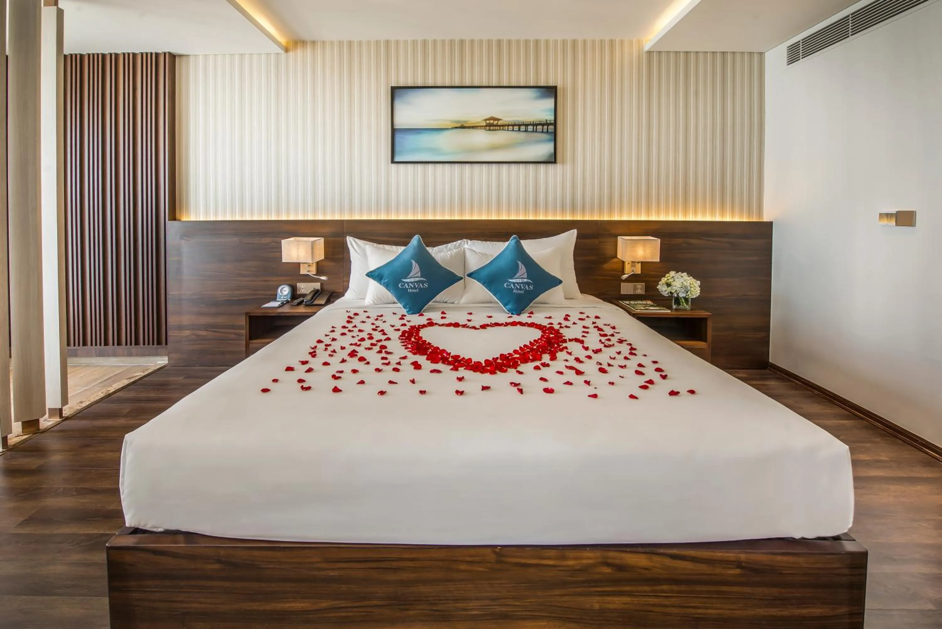 Bed in Canvas Danang Beach Hotel