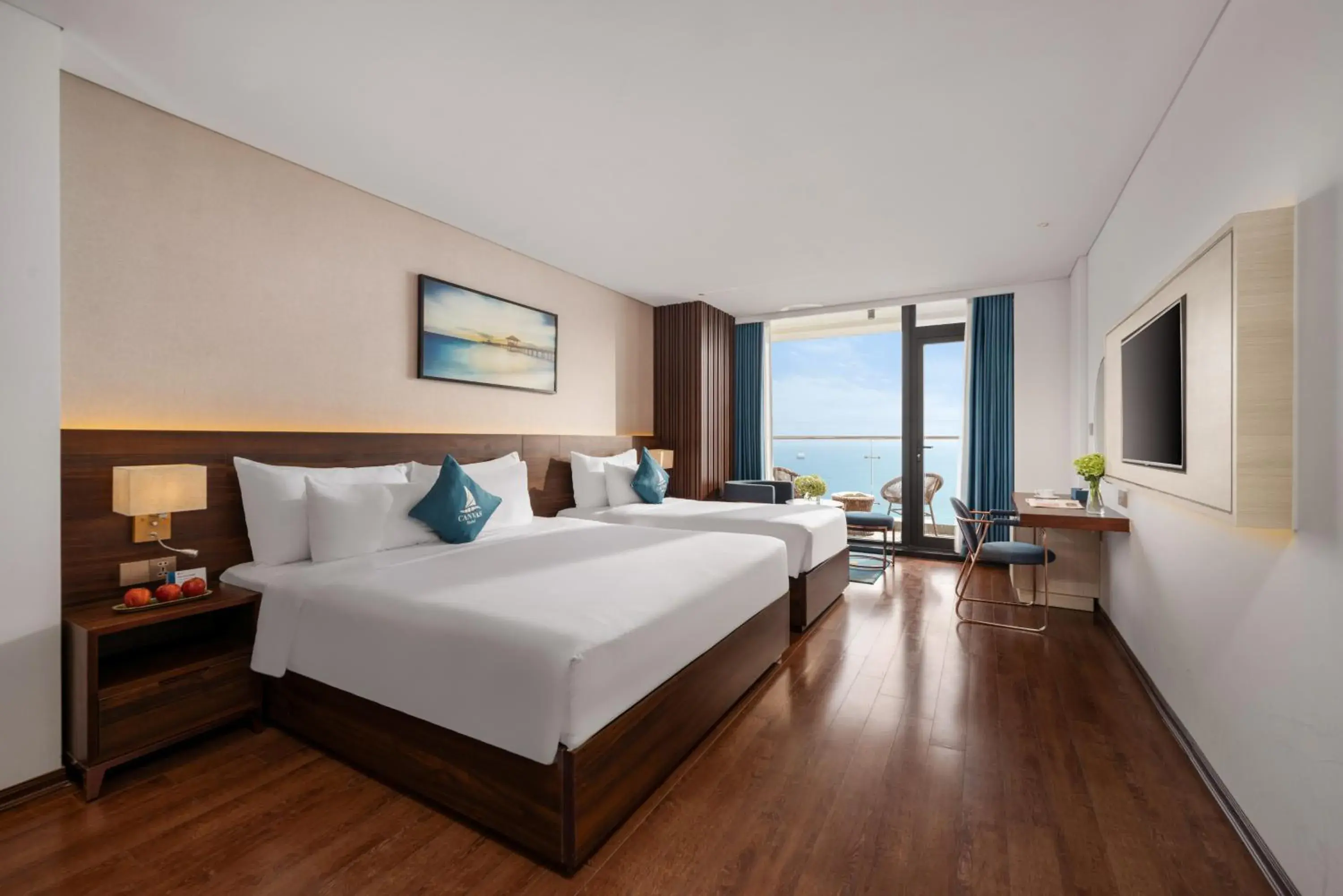 TV and multimedia, Bed in Canvas Danang Beach Hotel TV and multimedia, Bed in Canvas Danang Beach Hotel