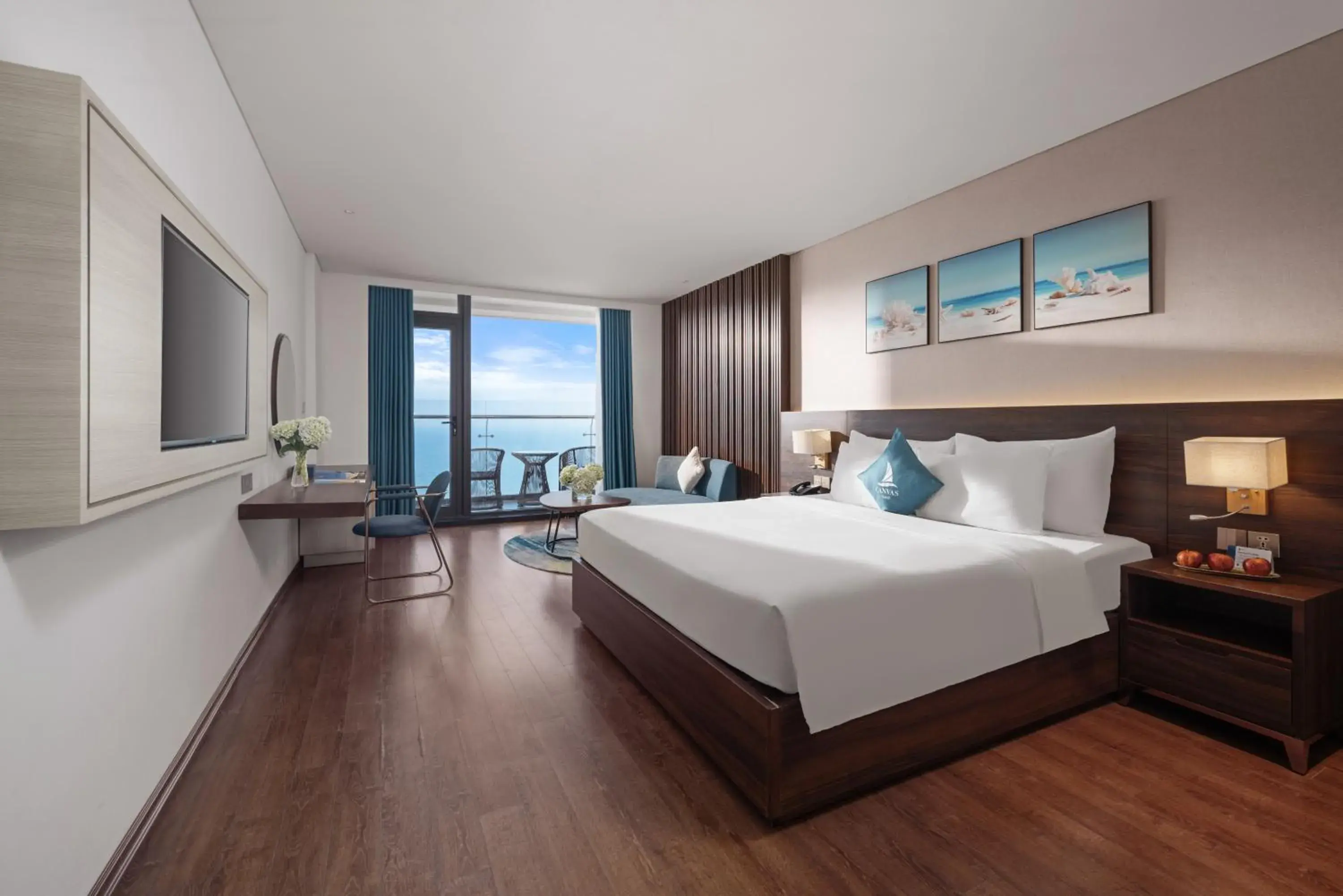 TV and multimedia, Bed in Canvas Danang Beach Hotel TV and multimedia, Bed in Canvas Danang Beach Hotel