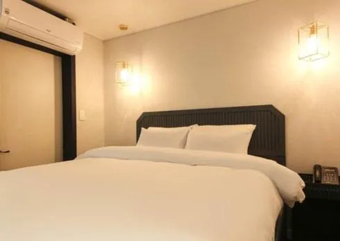 Bed in Sinan Equelim Hotel