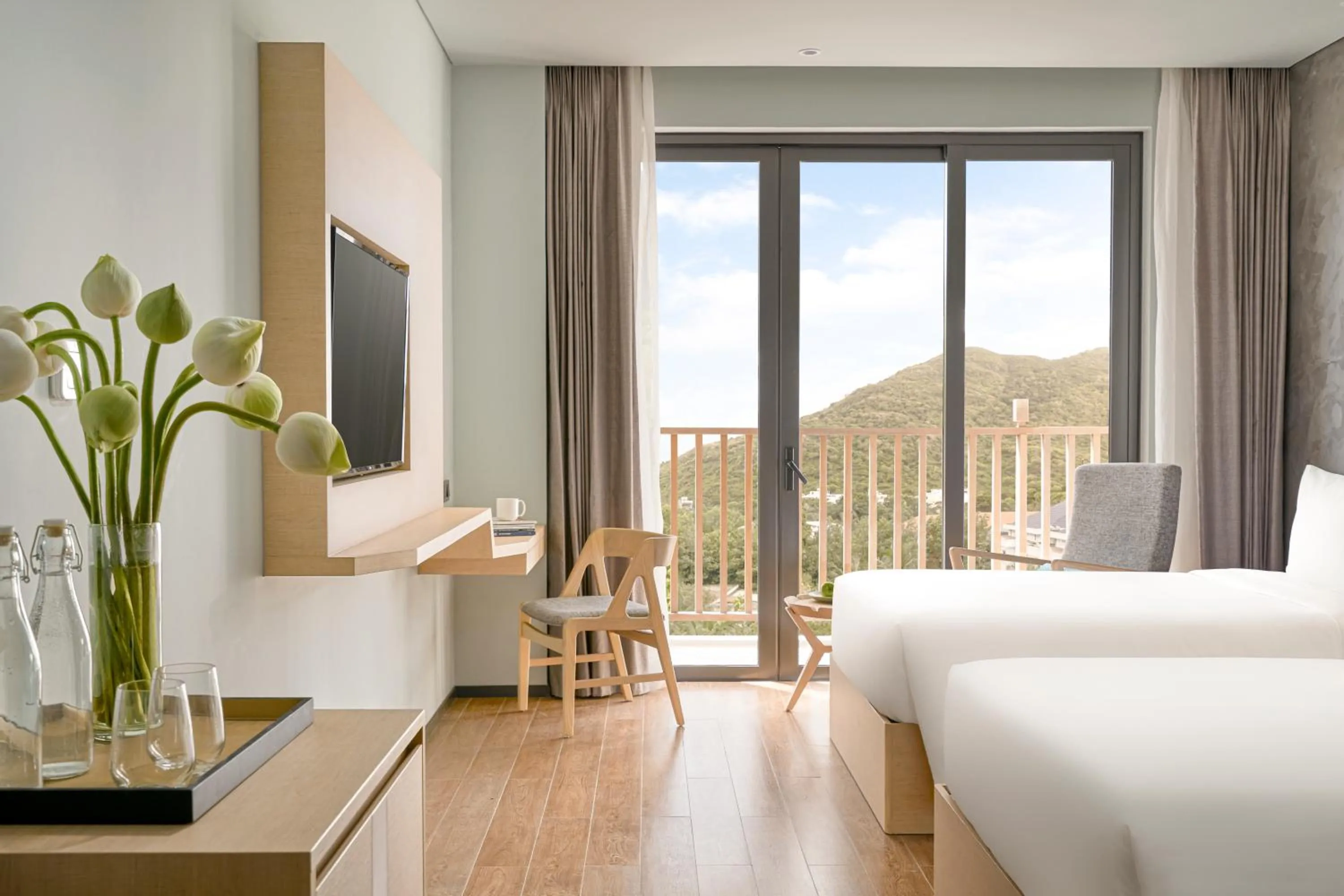 Seating area, Bed in The Secret Con Dao