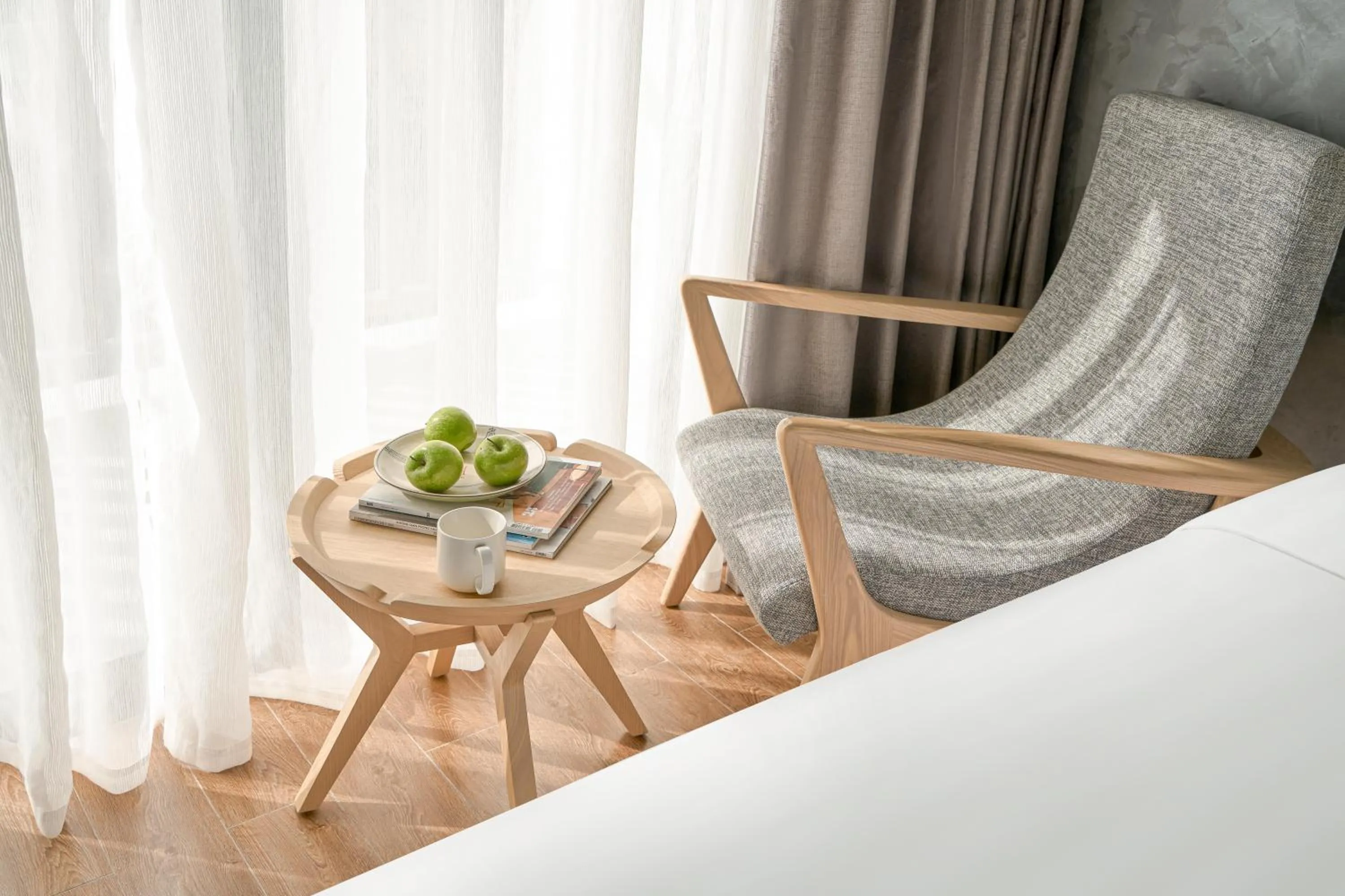 Seating area, Bed in The Secret Con Dao