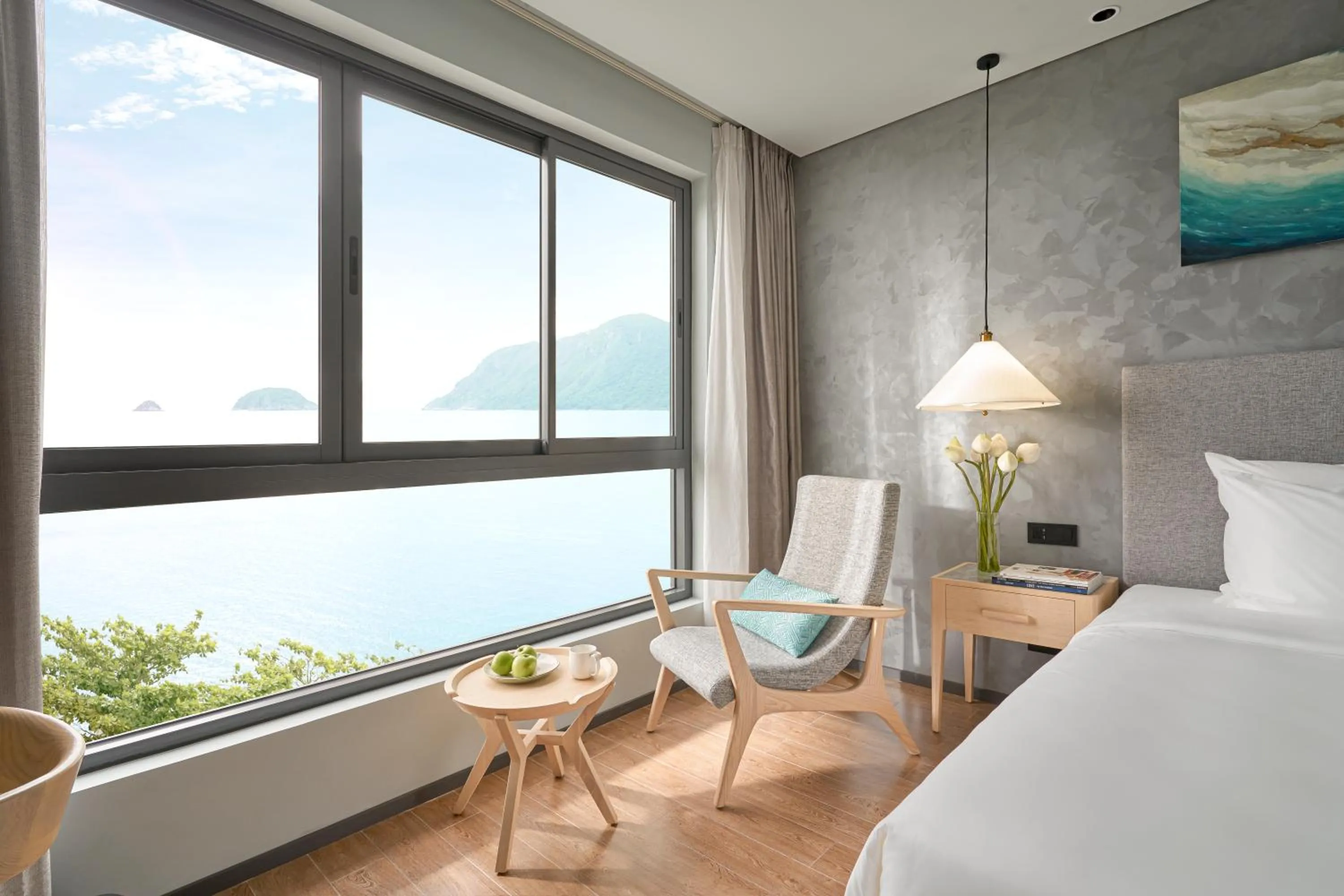 Seating area, Bed in The Secret Con Dao