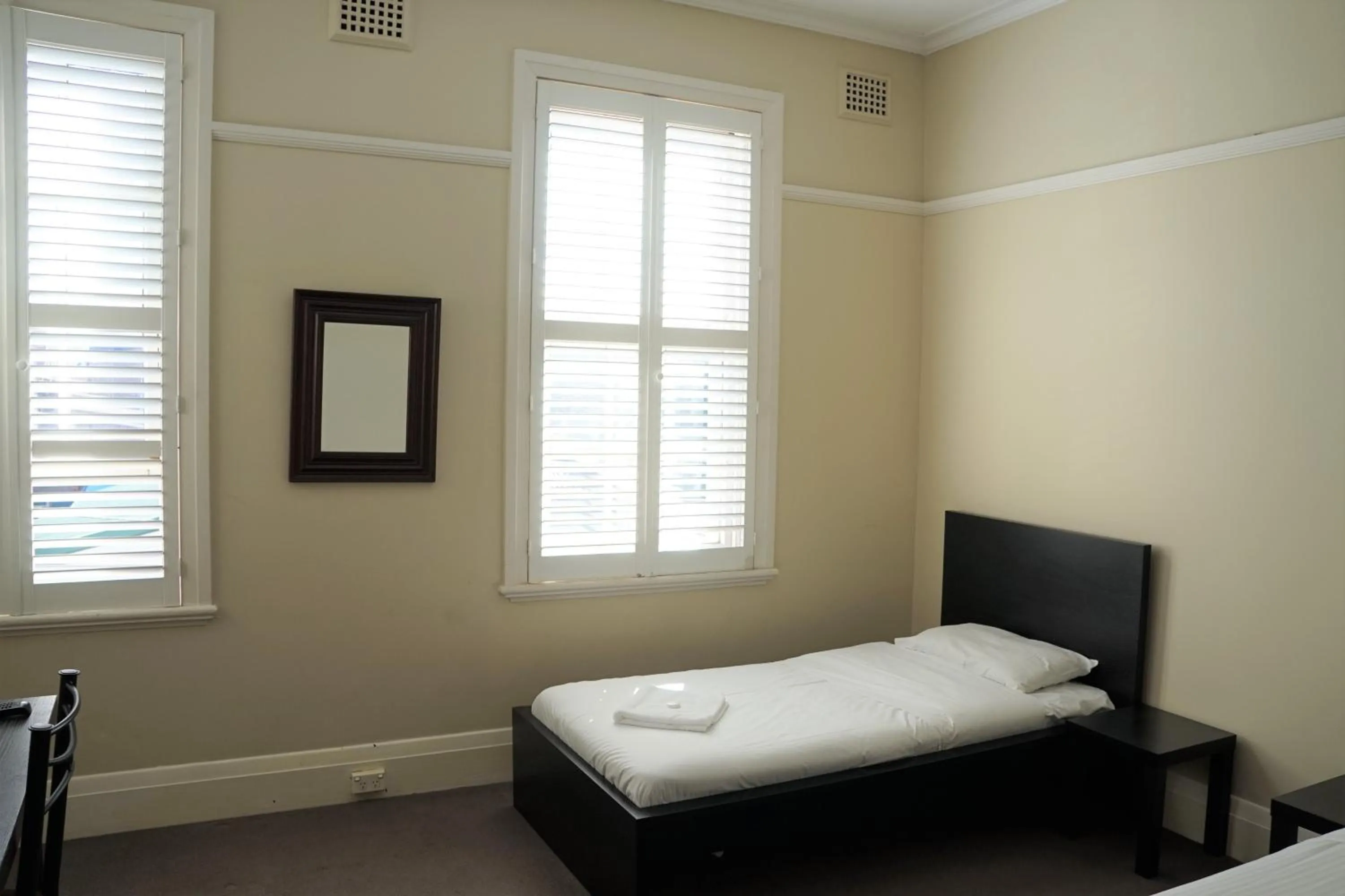 Bed in Palace Hotel Mortlake Sydney