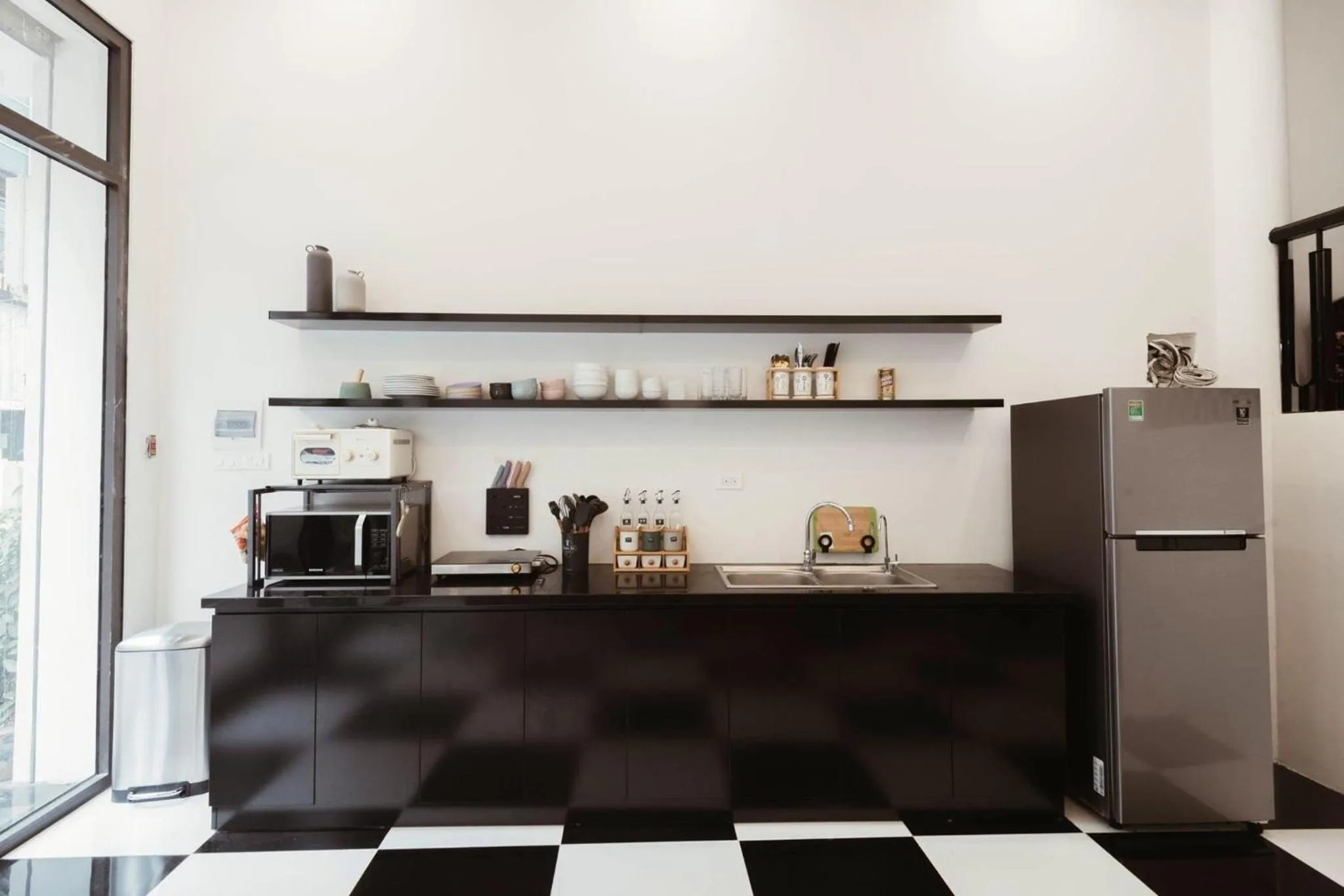 Communal kitchen in The Q Boutique and Home