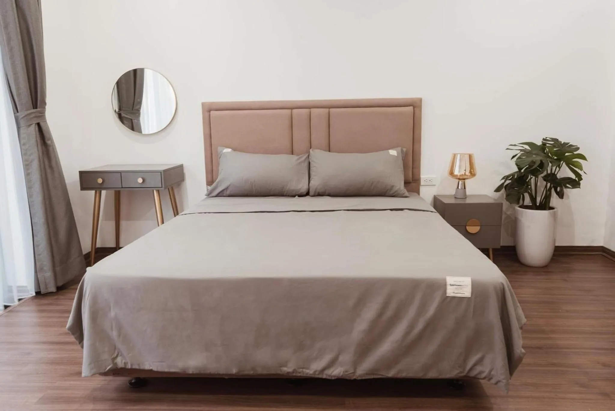 Bed in The Q Boutique and Home