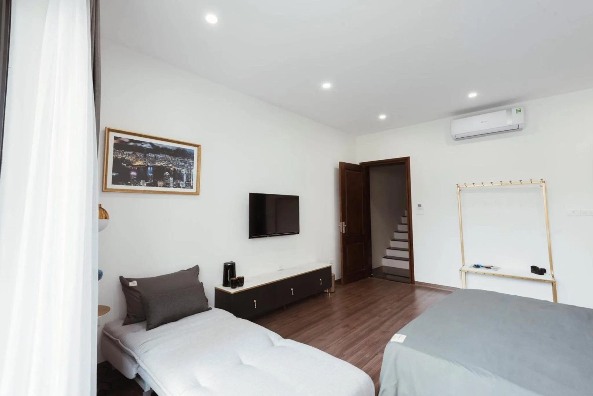 Photo of the whole room, Bed in The Q Boutique and Home