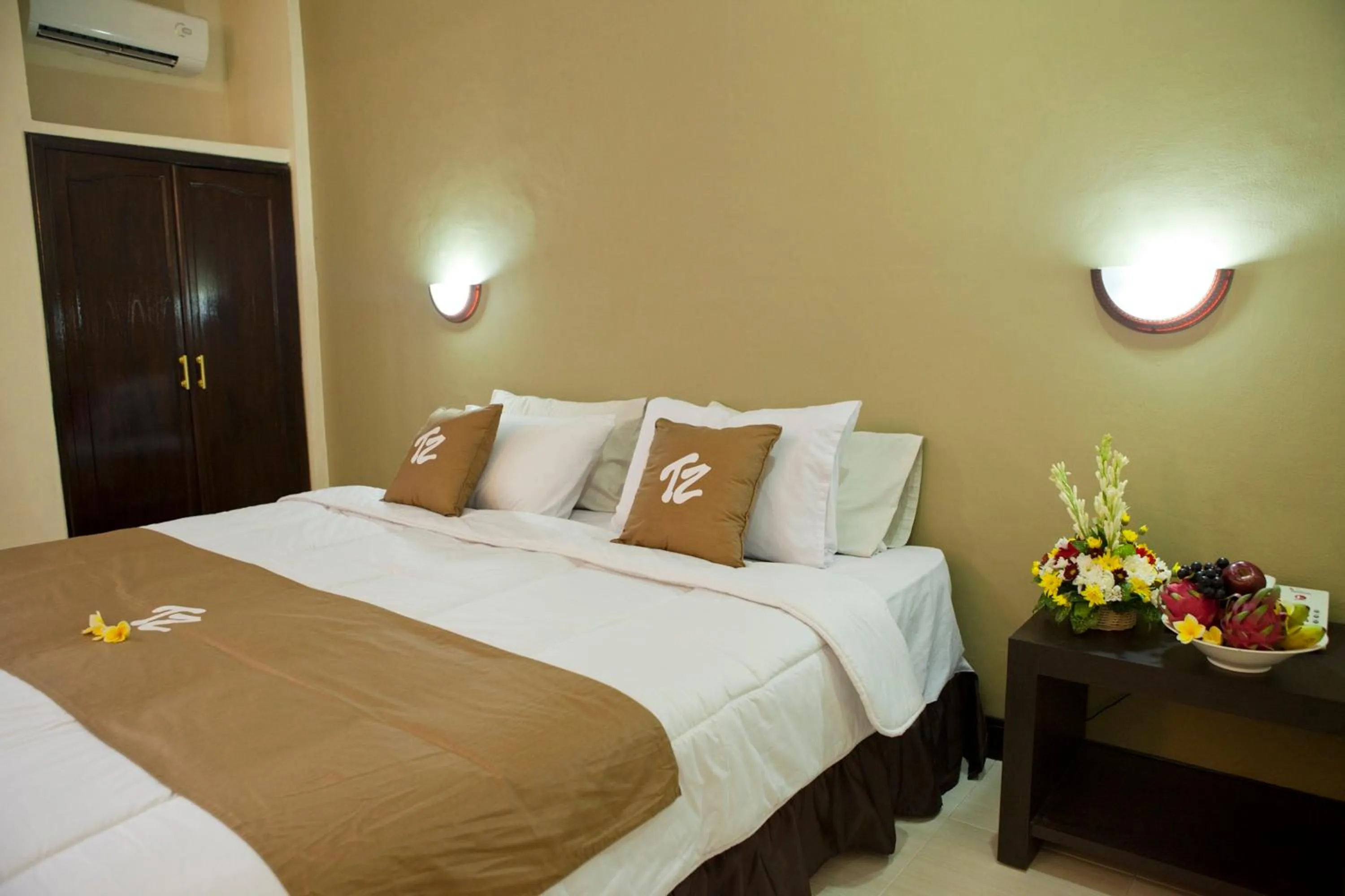 Bed in Troppo Zone Puri Rama Resort Kuta