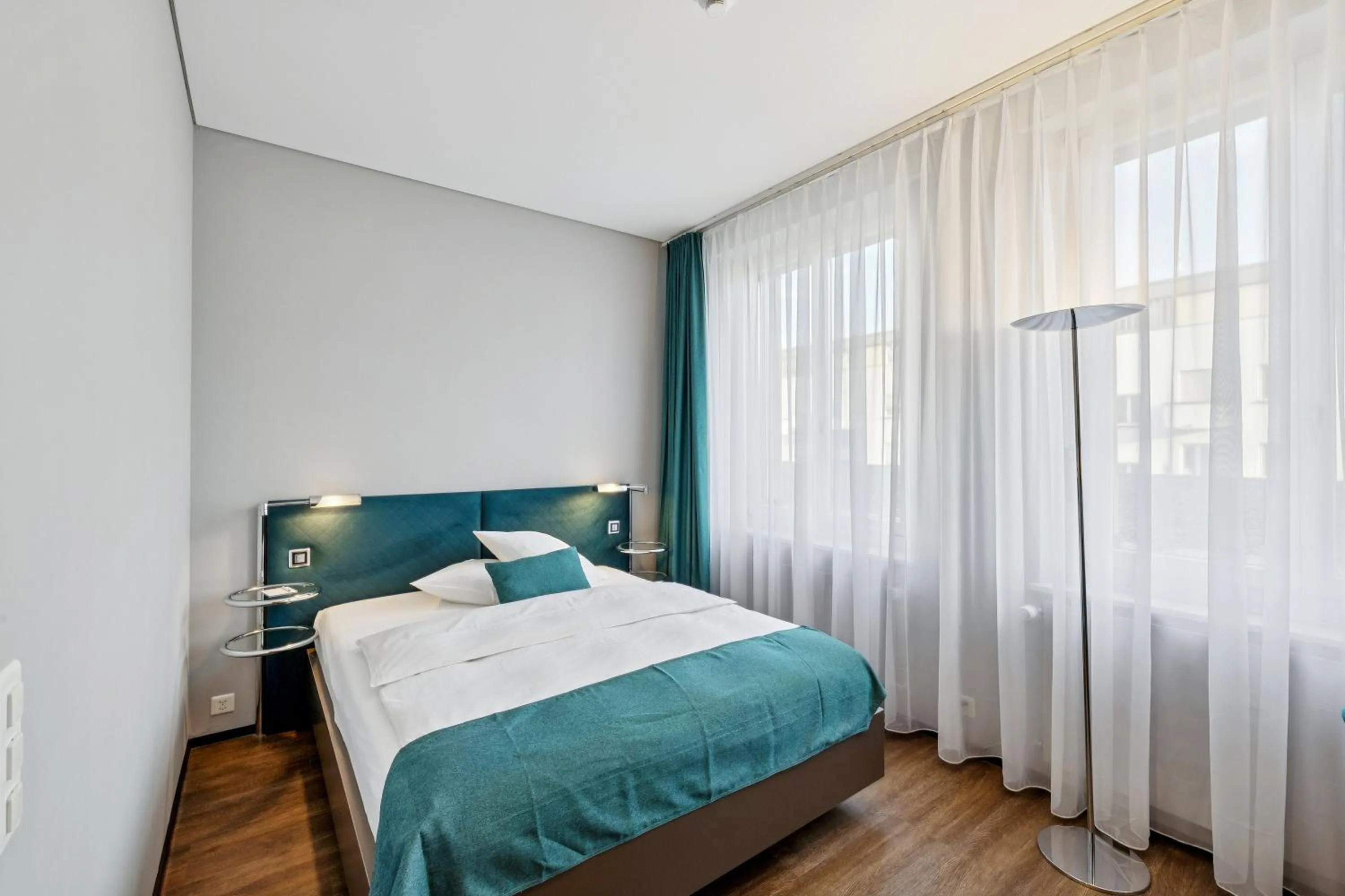 Bed in GLANDON Rooms Elite