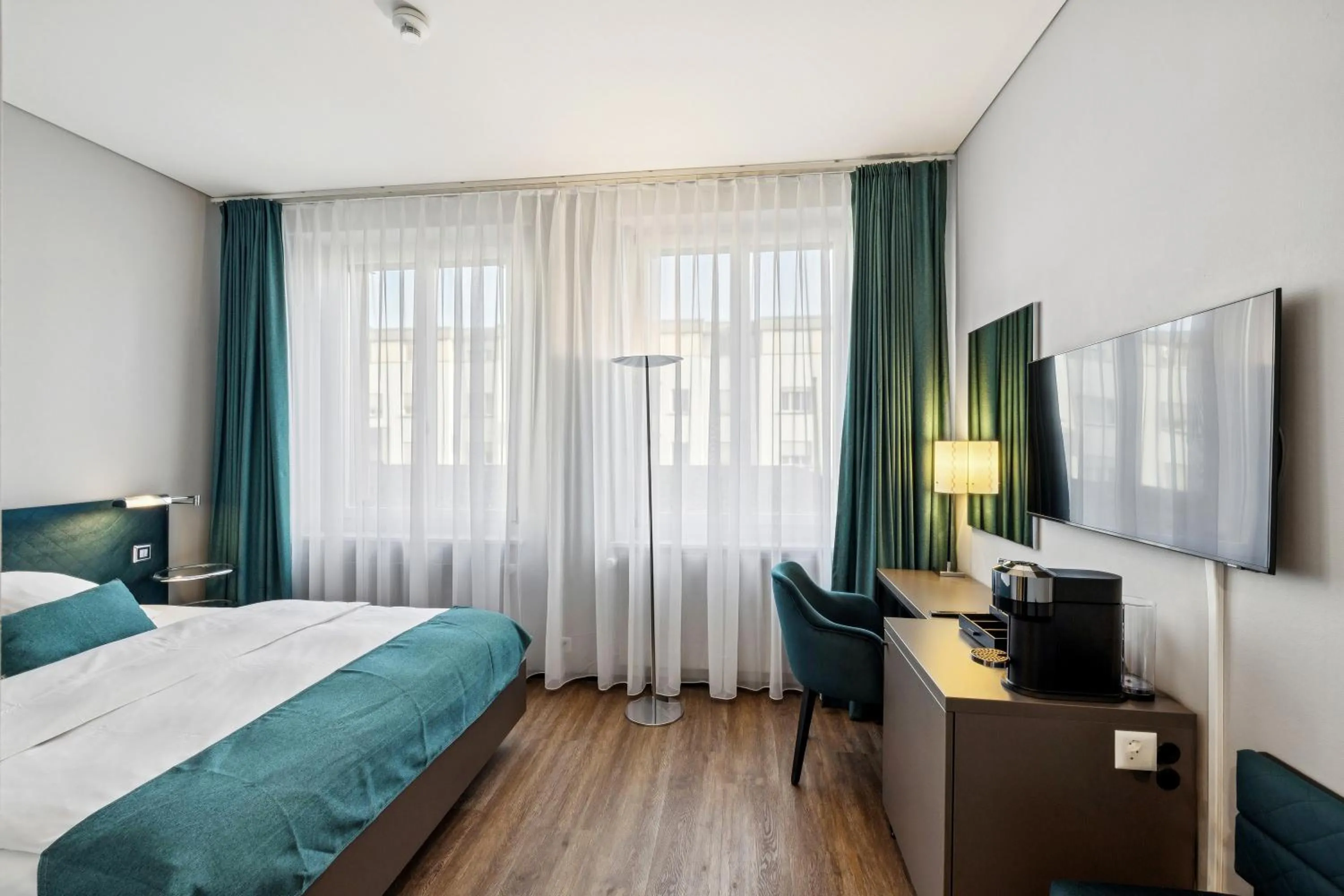 Bed in GLANDON Rooms Elite