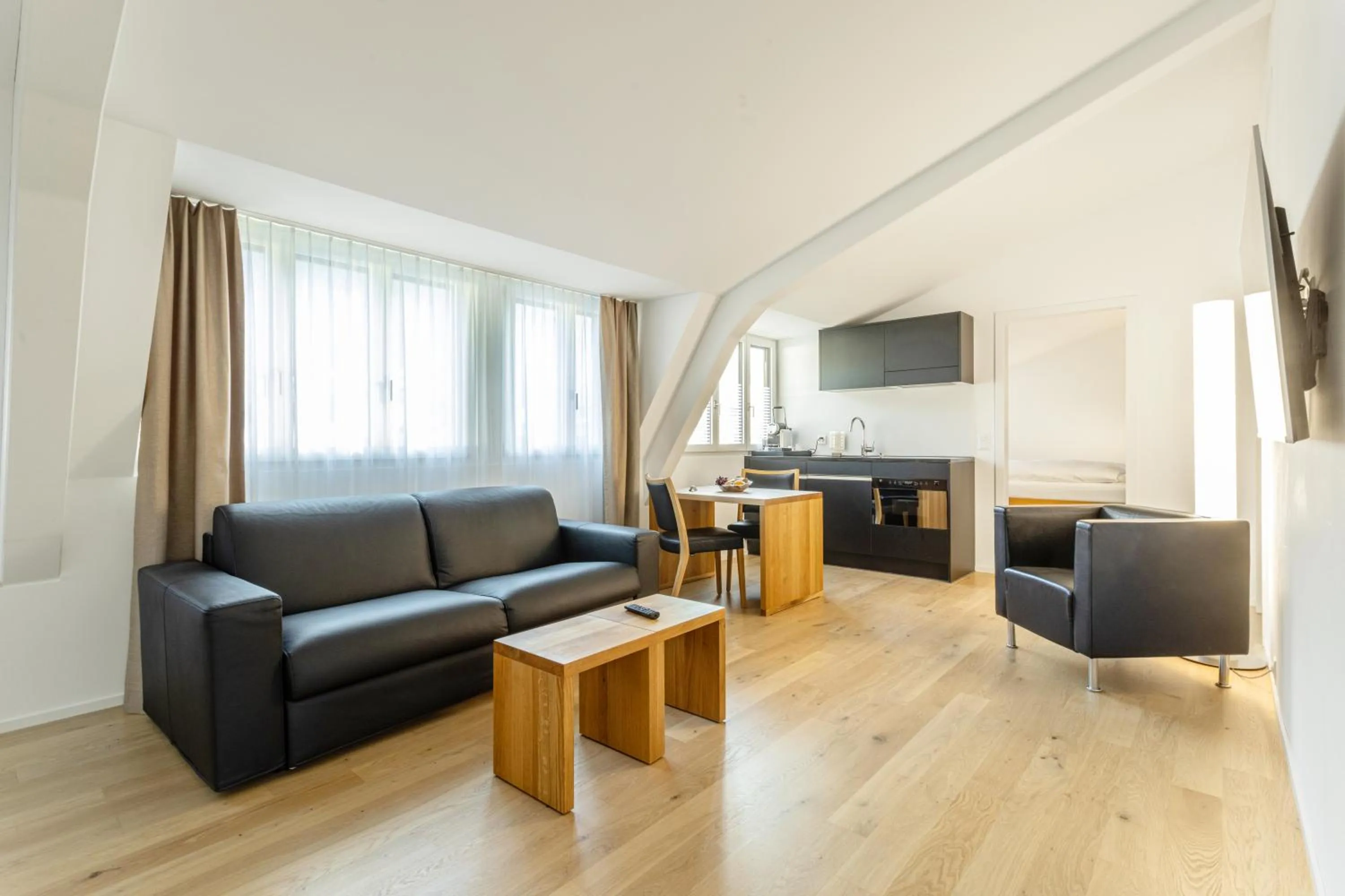 Communal lounge/ TV room in ABC Swiss Quality Hotel