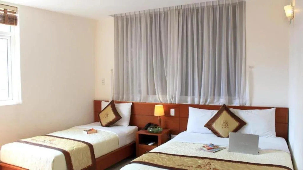 Bed in The Alley Saigon Hotel