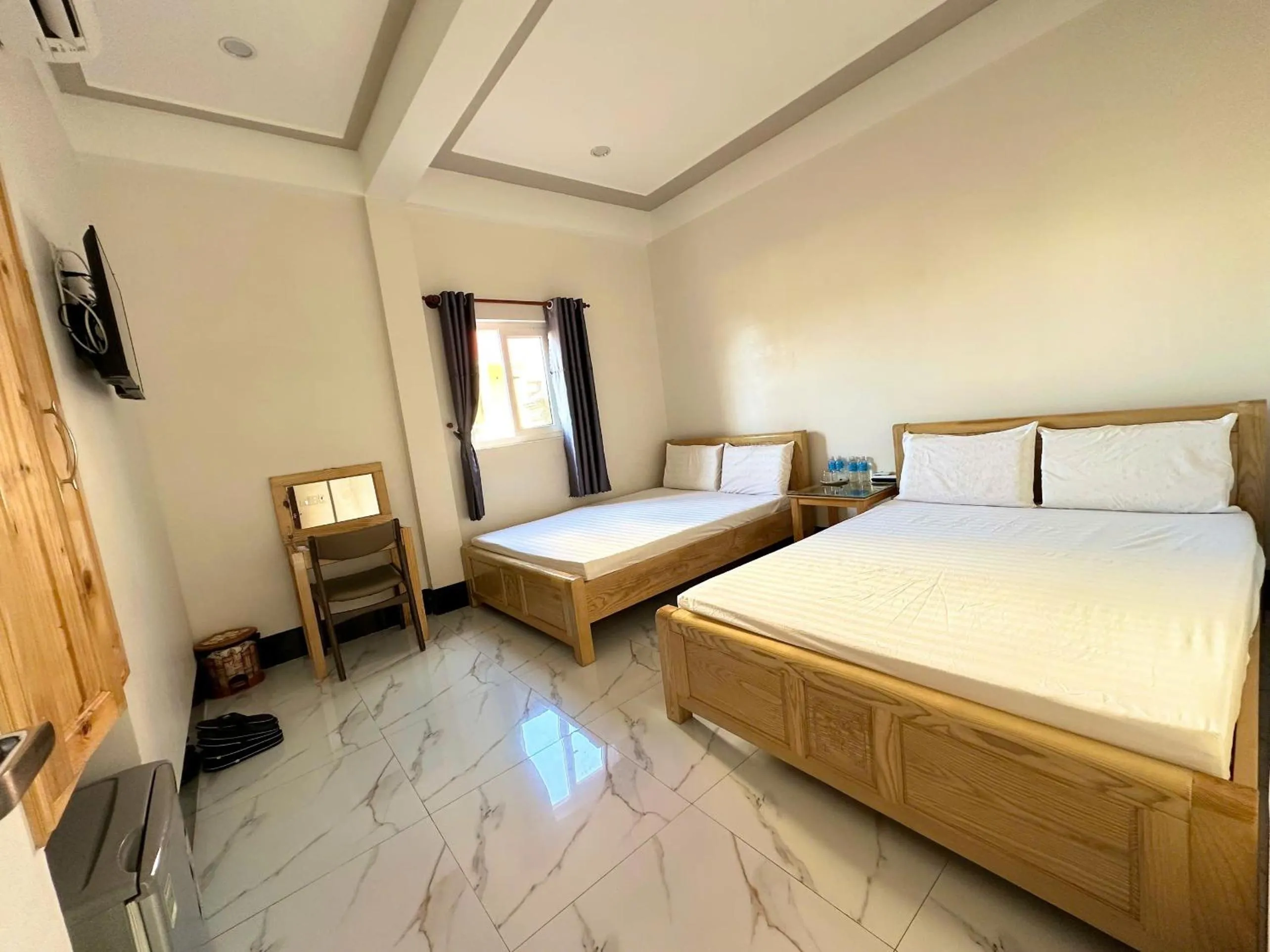 Bed in PHUONG QUYEN hotel