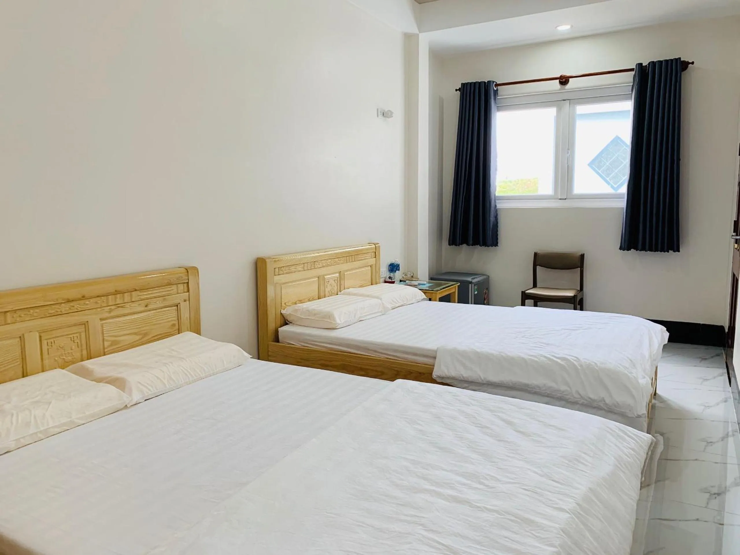 Bed in PHUONG QUYEN hotel