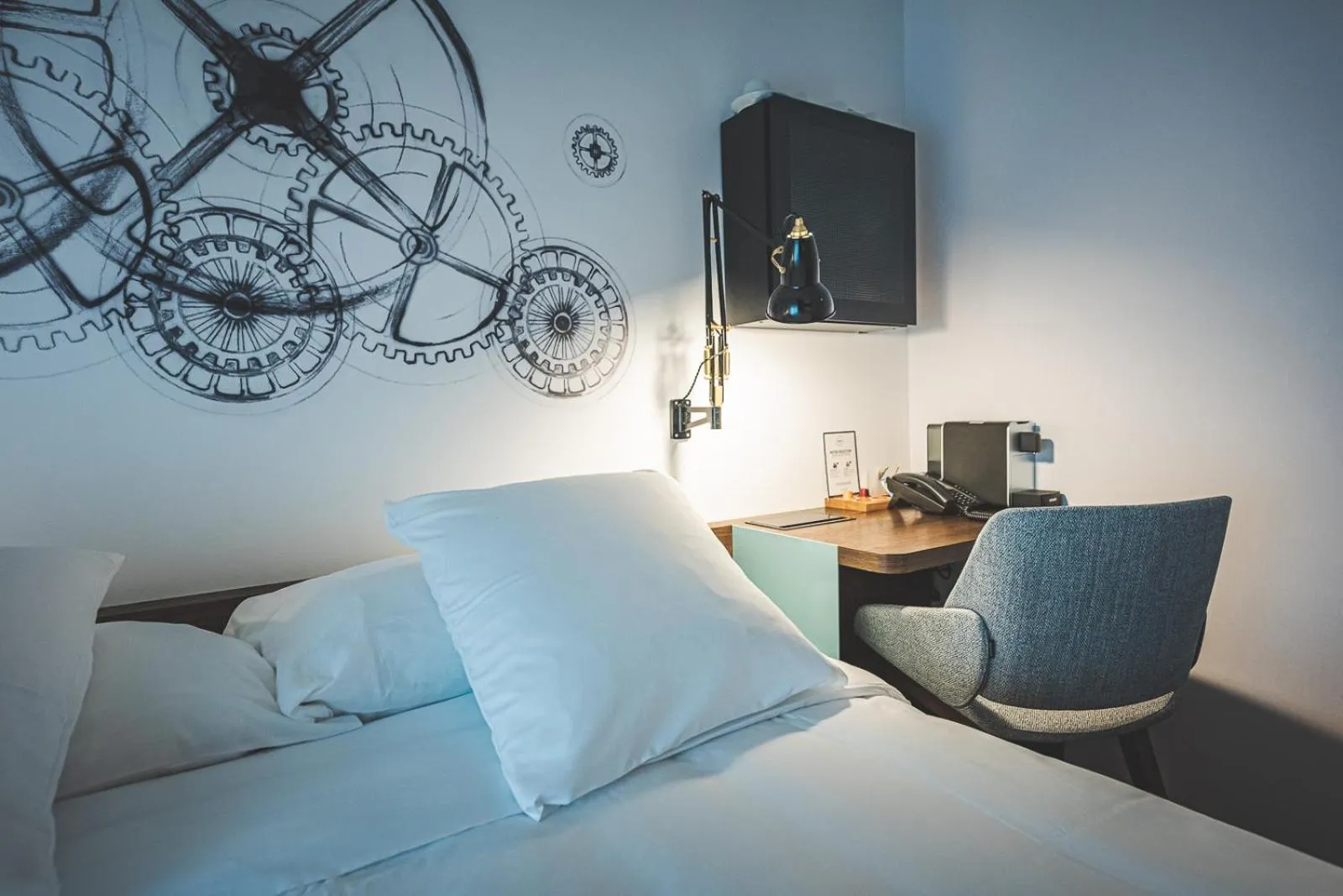 Bed in Hotel Bernina Geneva