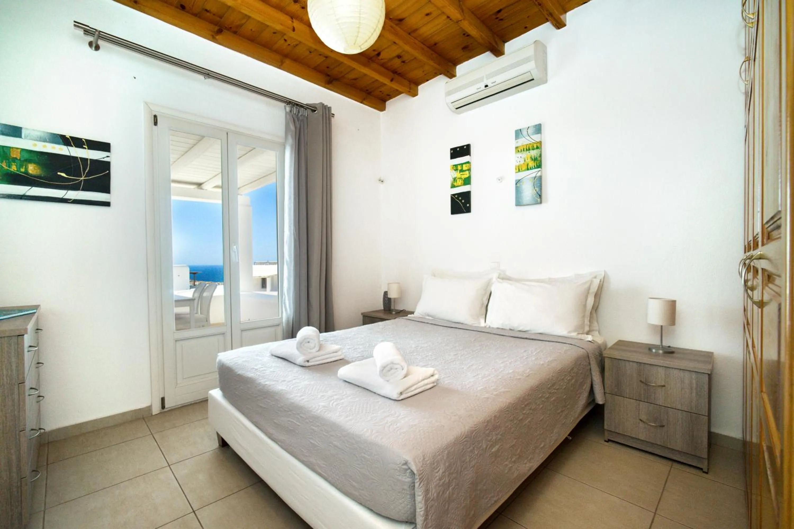 Bed in Anius Apartments