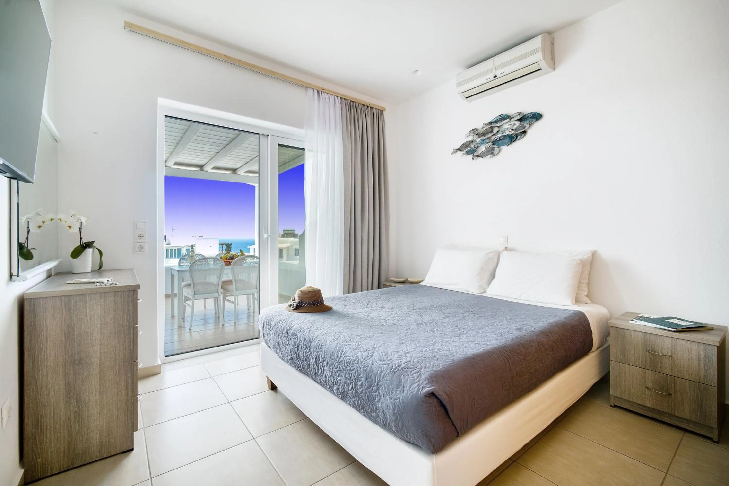 Bed in Anius Apartments