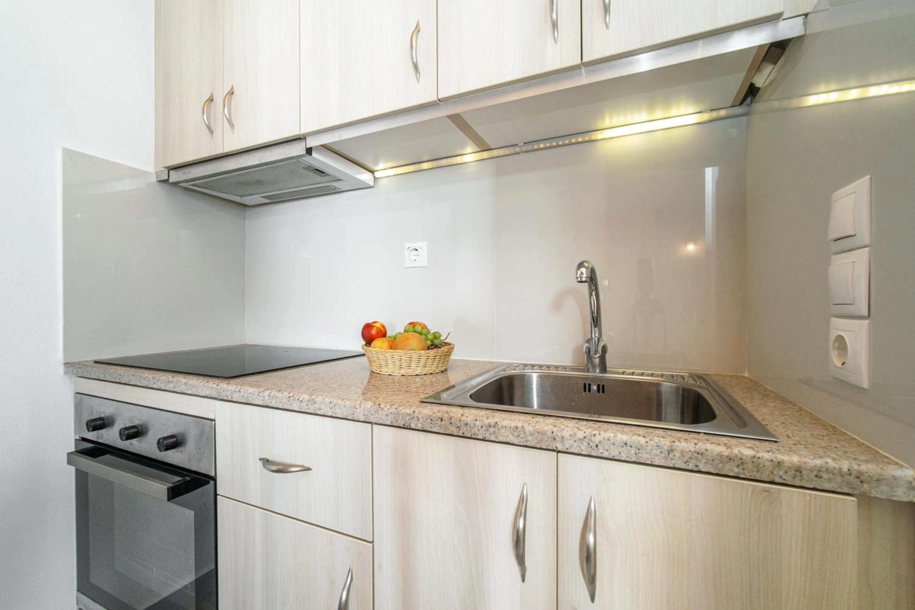 Kitchen or kitchenette in Anius Apartments