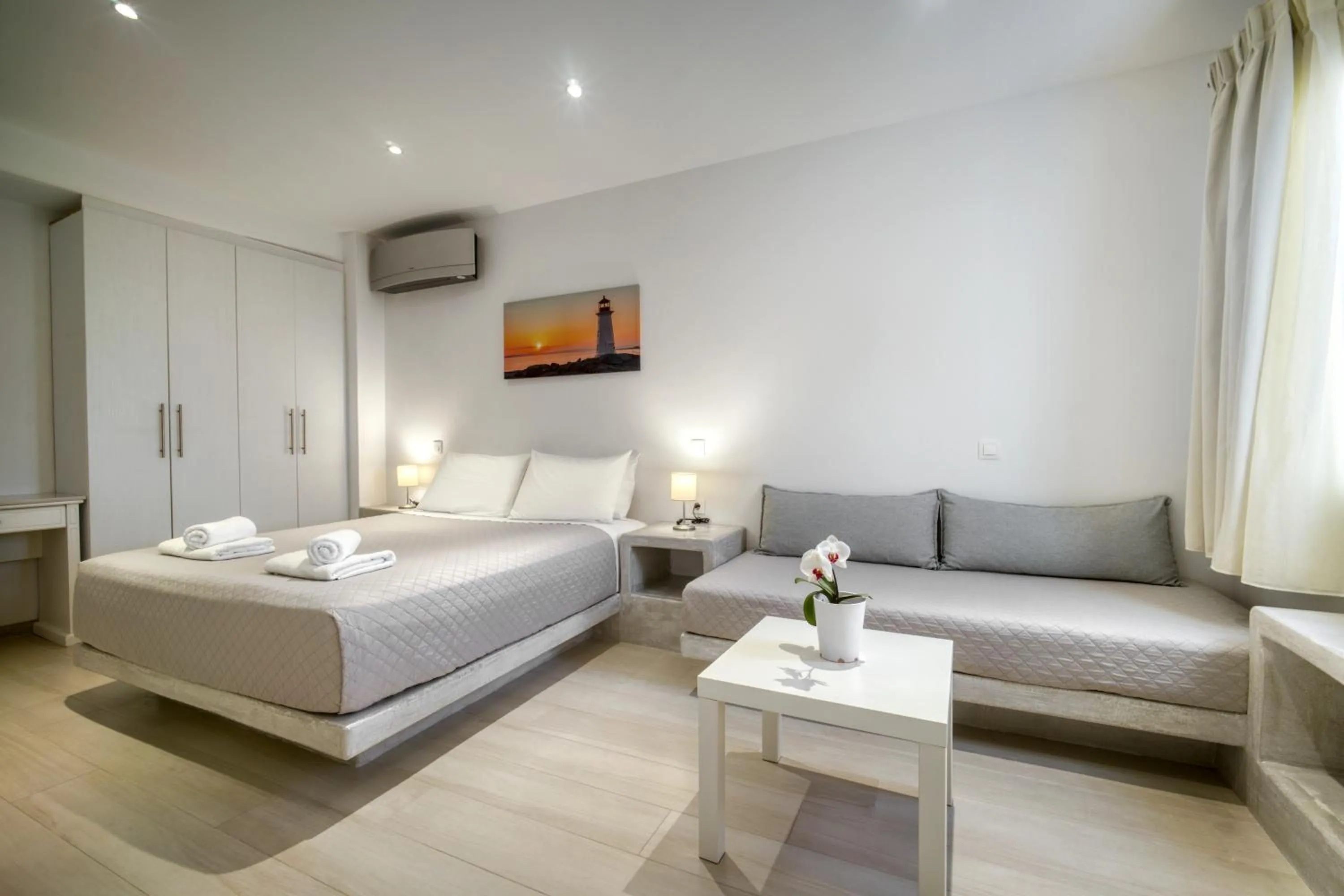 Bed in Anius Apartments