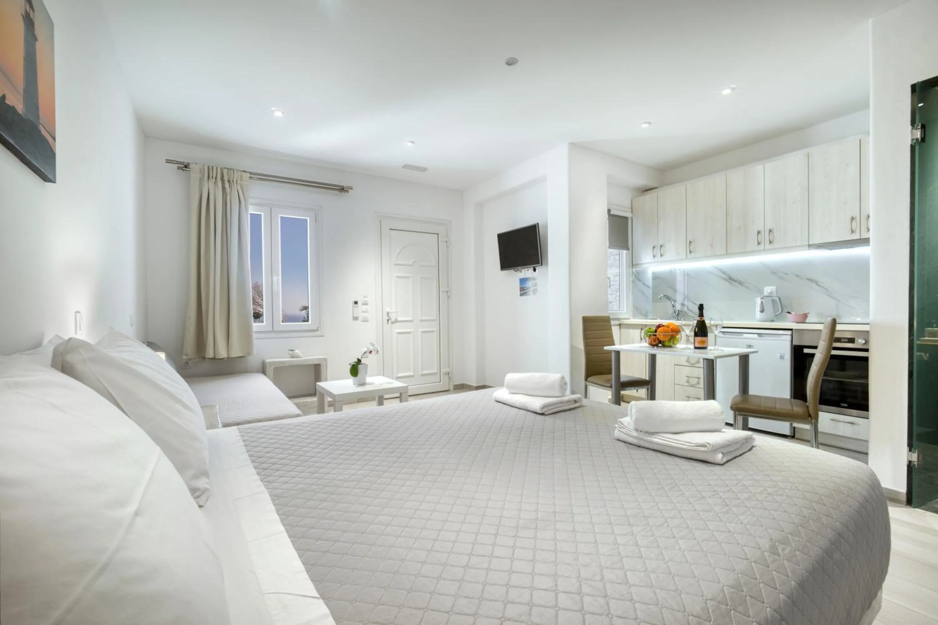 Bed in Anius Apartments