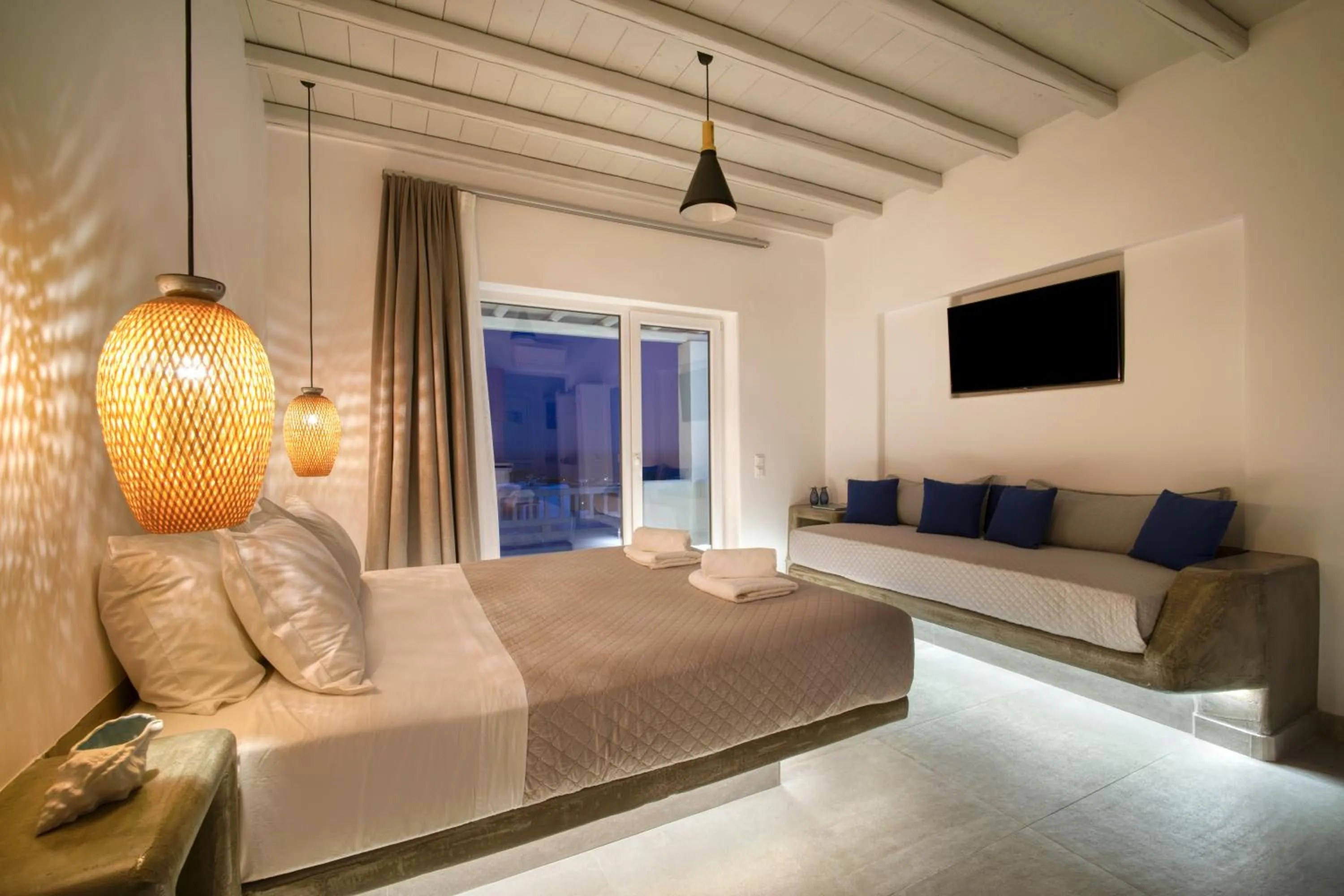 Bed in Anius Apartments