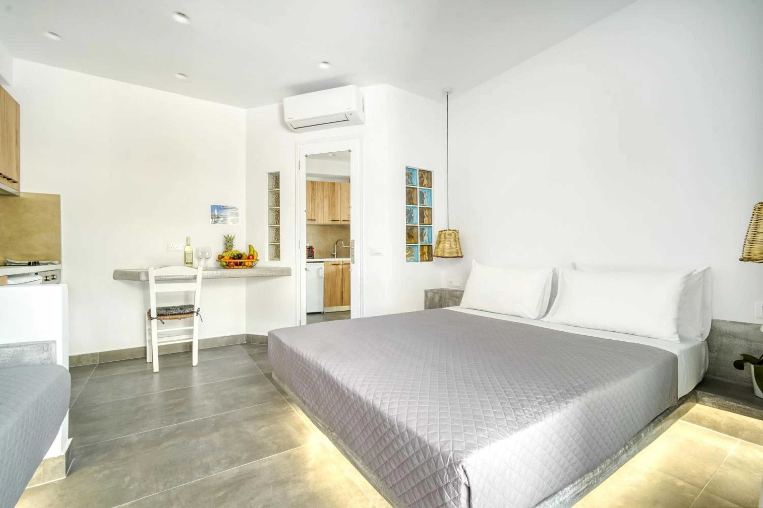 Bed in Anius Apartments