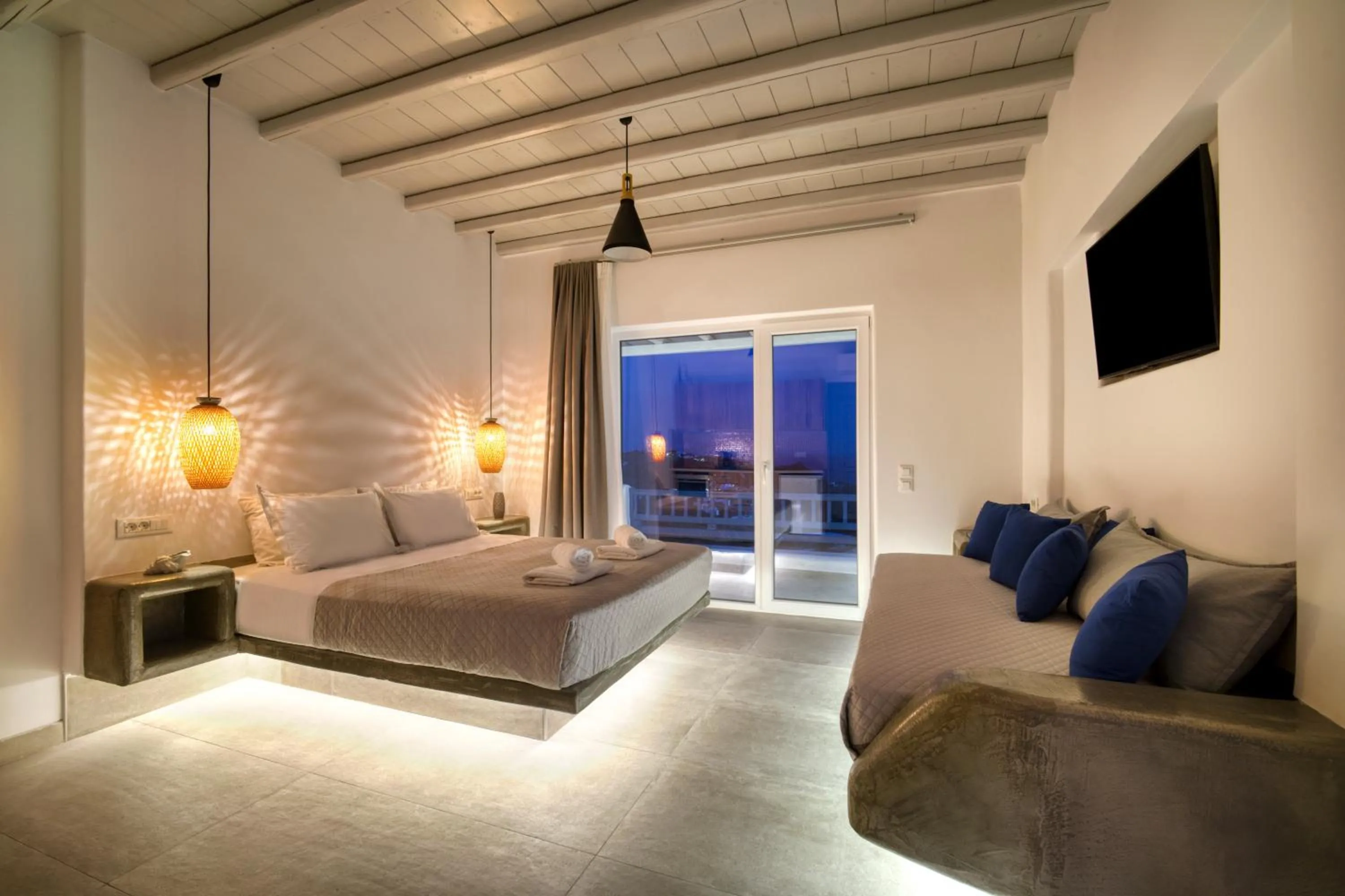 Bed in Anius Apartments