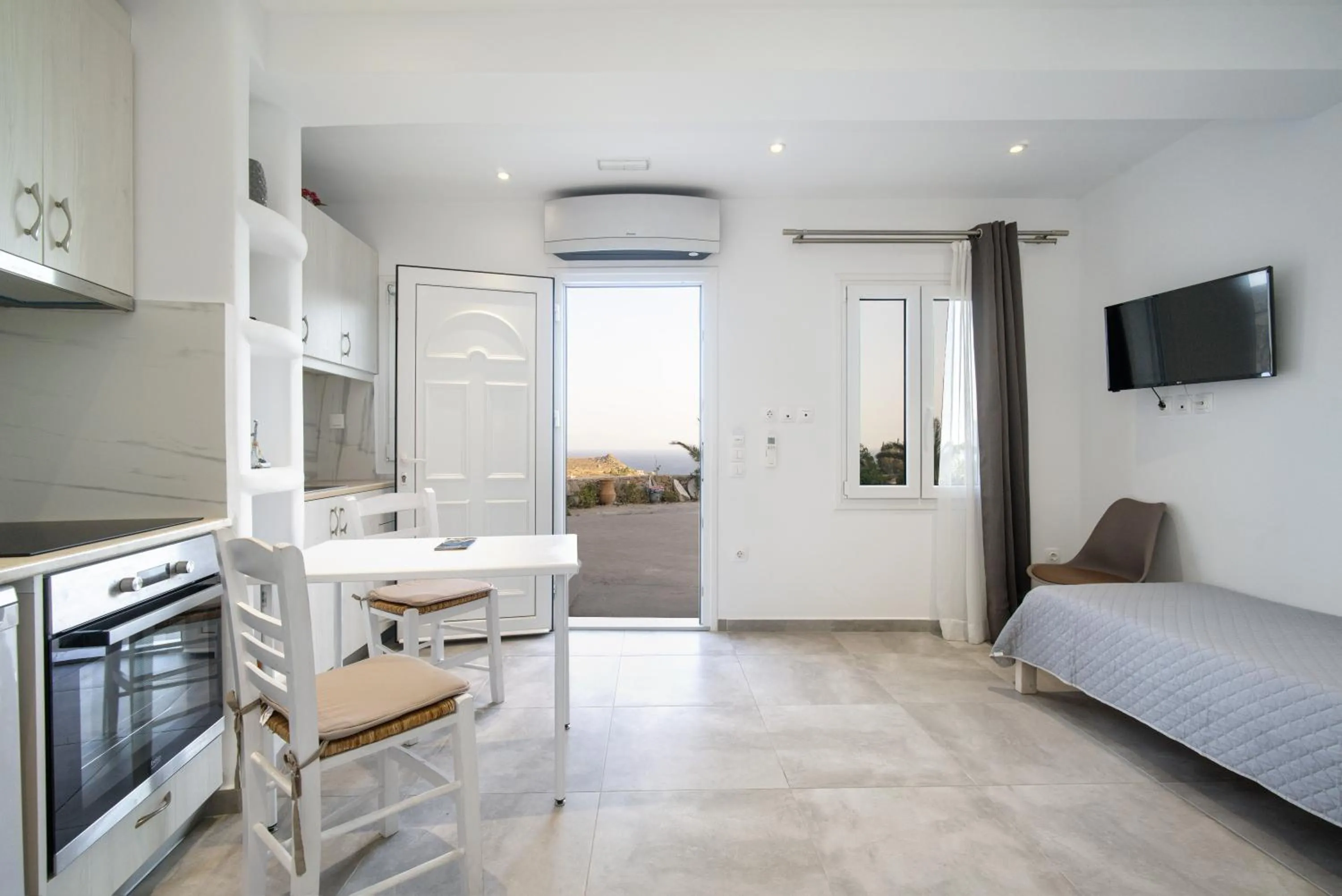 Bed in Anius Apartments