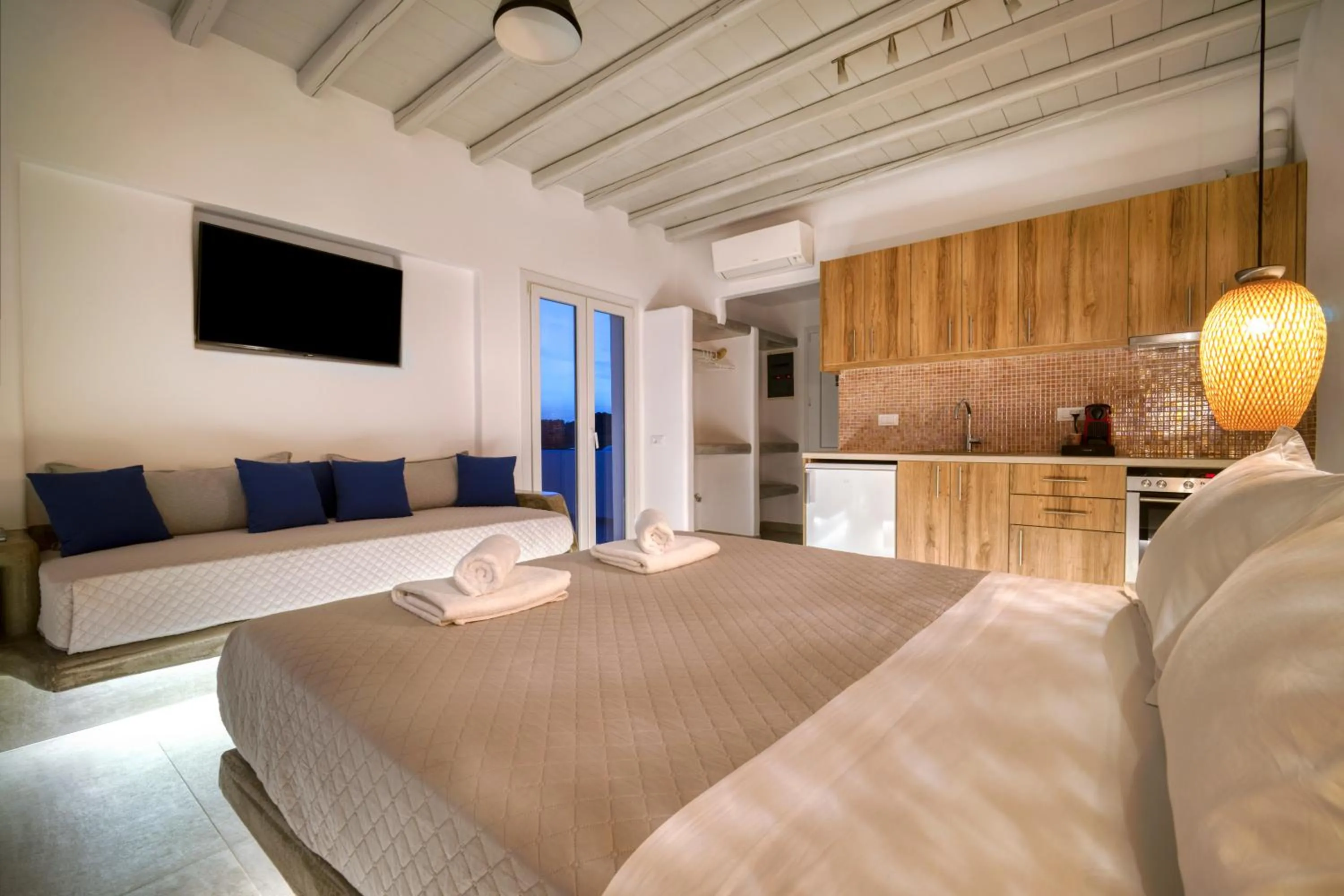 Bed in Anius Apartments