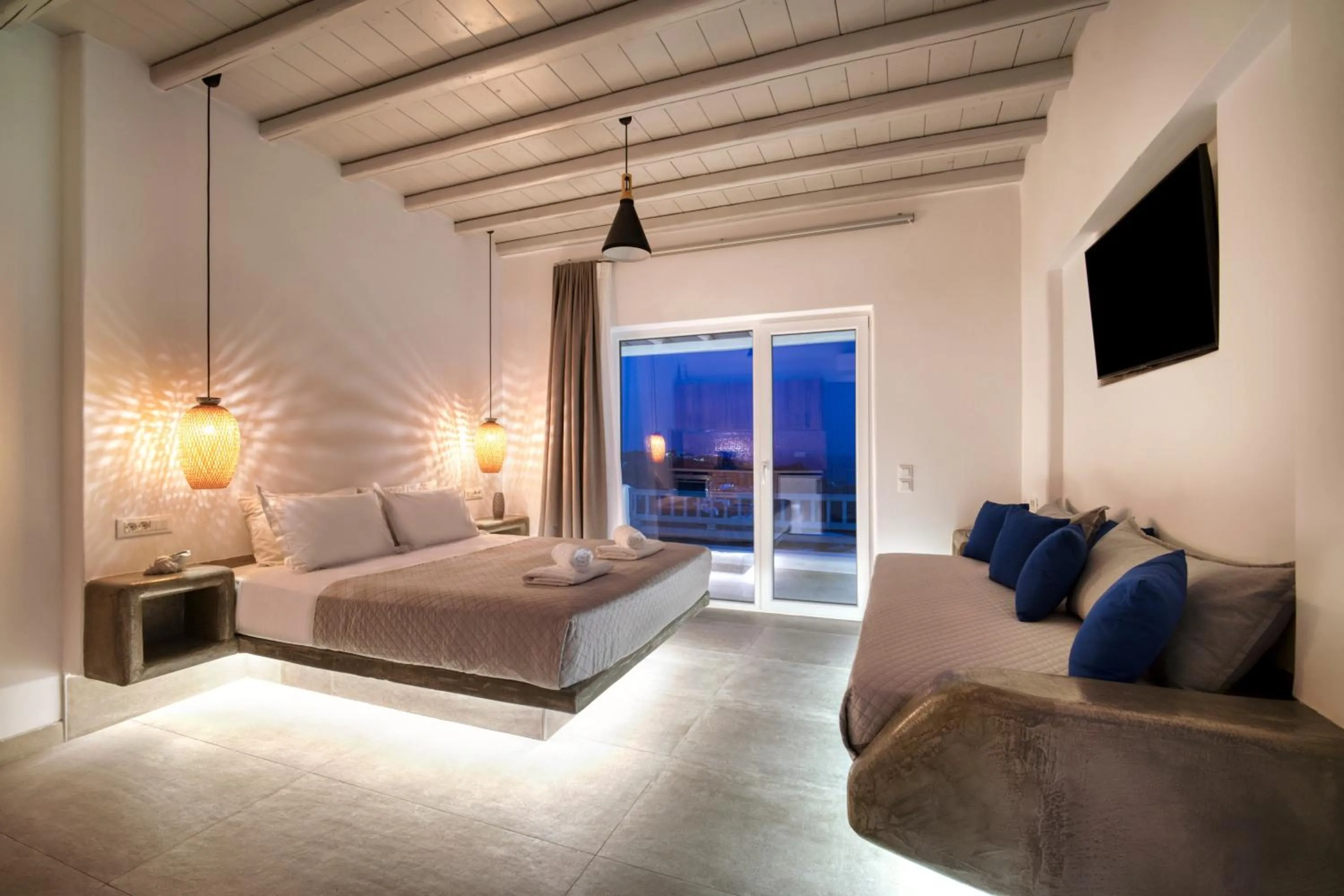 Bed in Anius Apartments