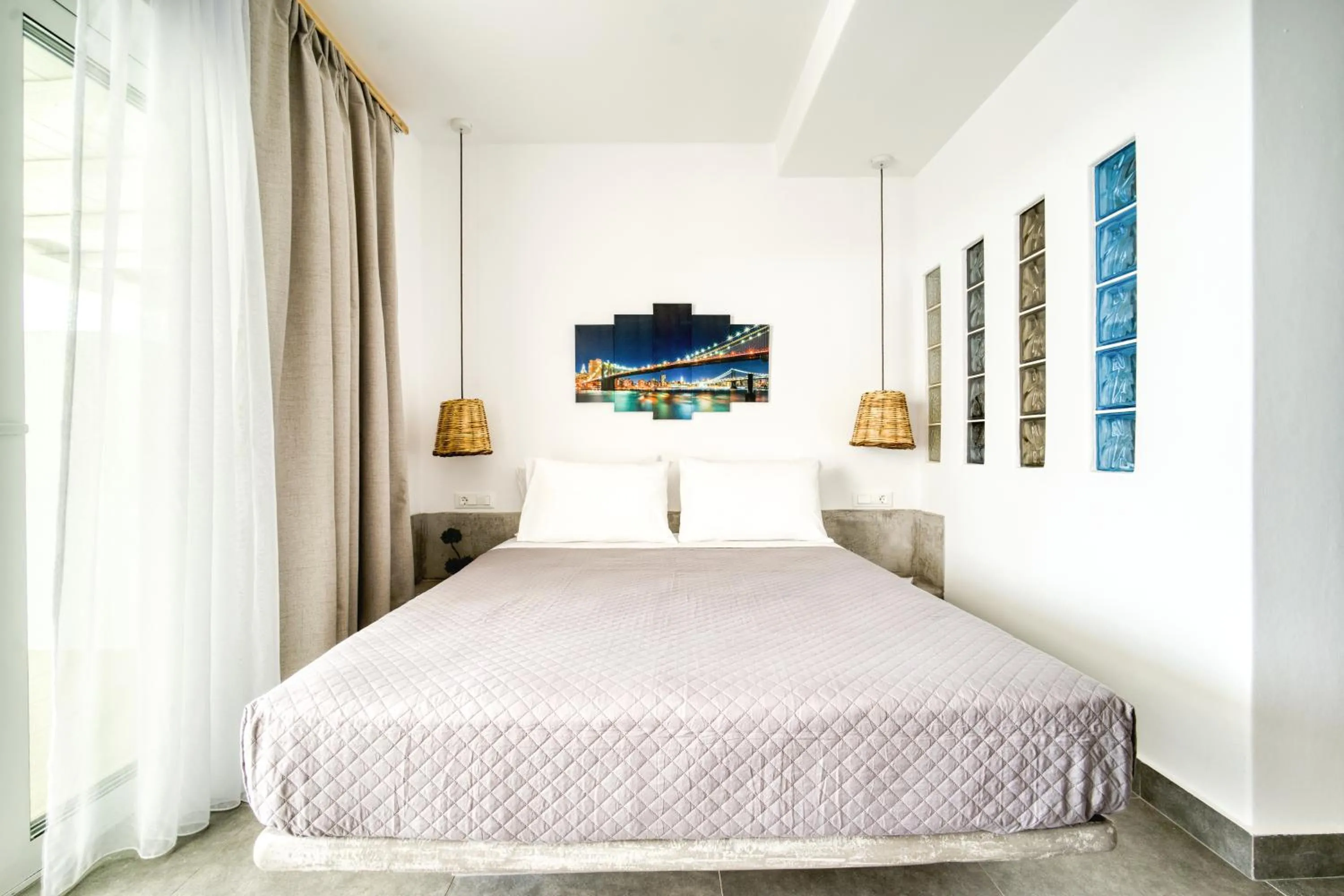Bed in Anius Apartments