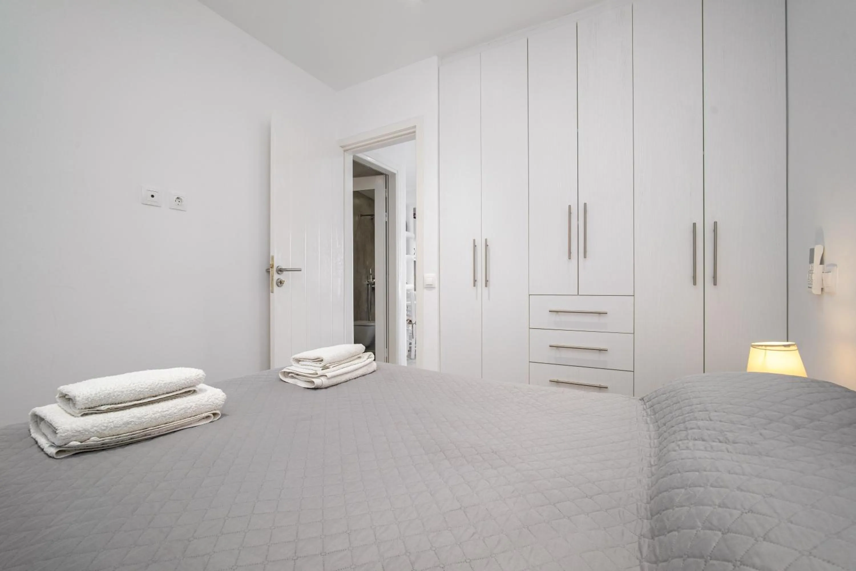 Bed in Anius Apartments