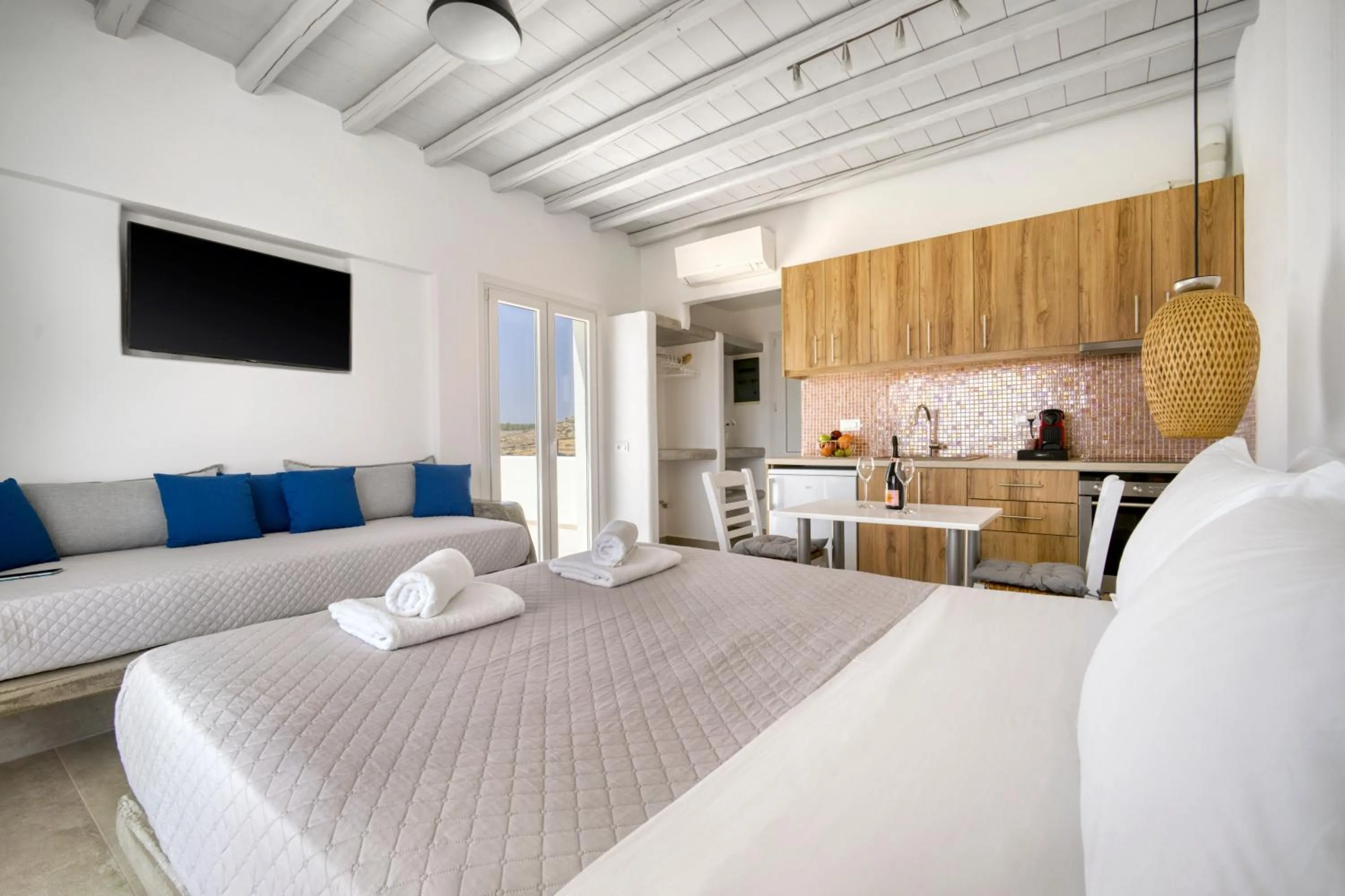 Bed in Anius Apartments