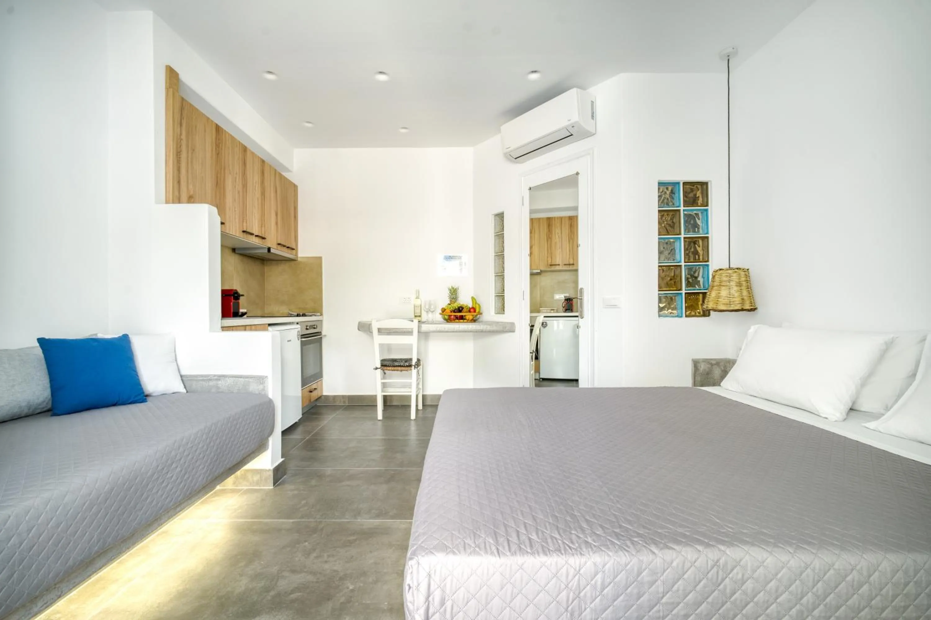 Bed in Anius Apartments