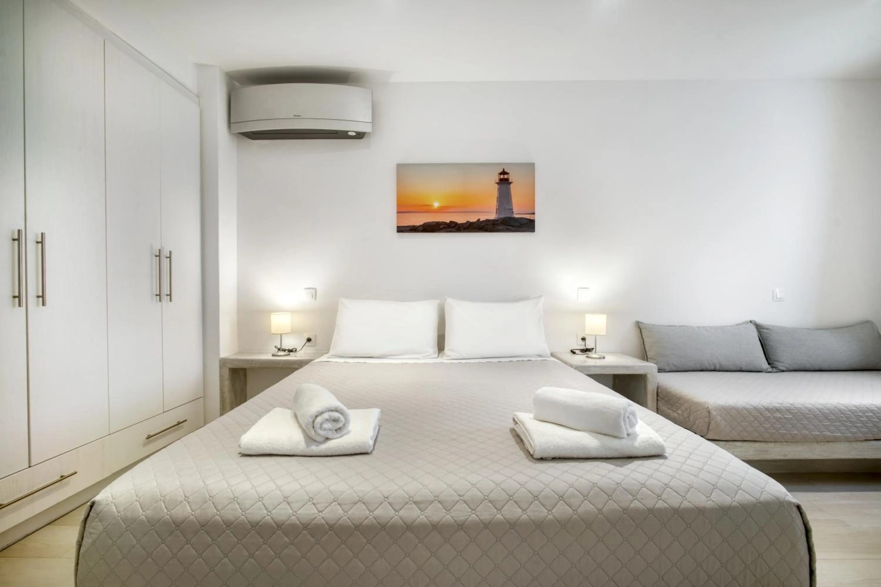 Bed in Anius Apartments