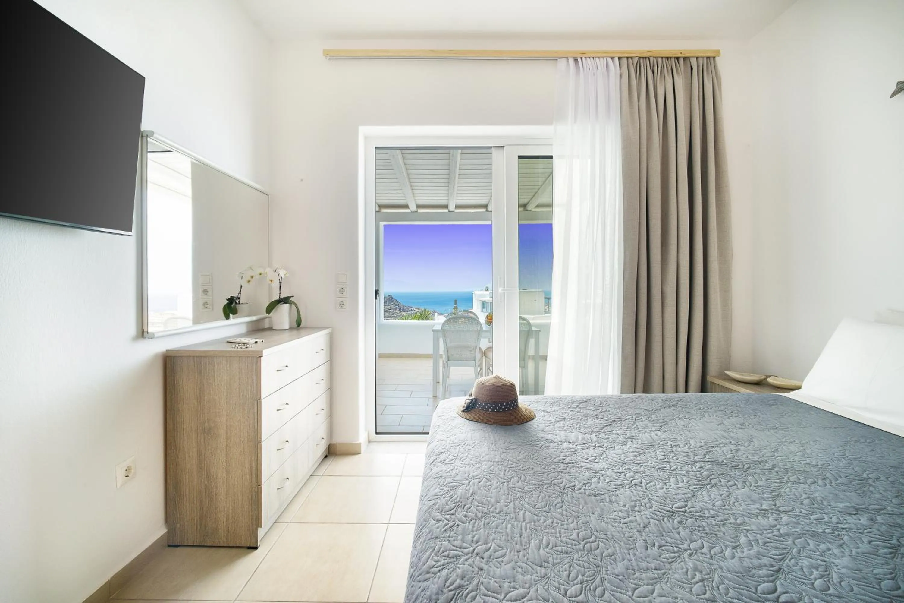 Bed in Anius Apartments