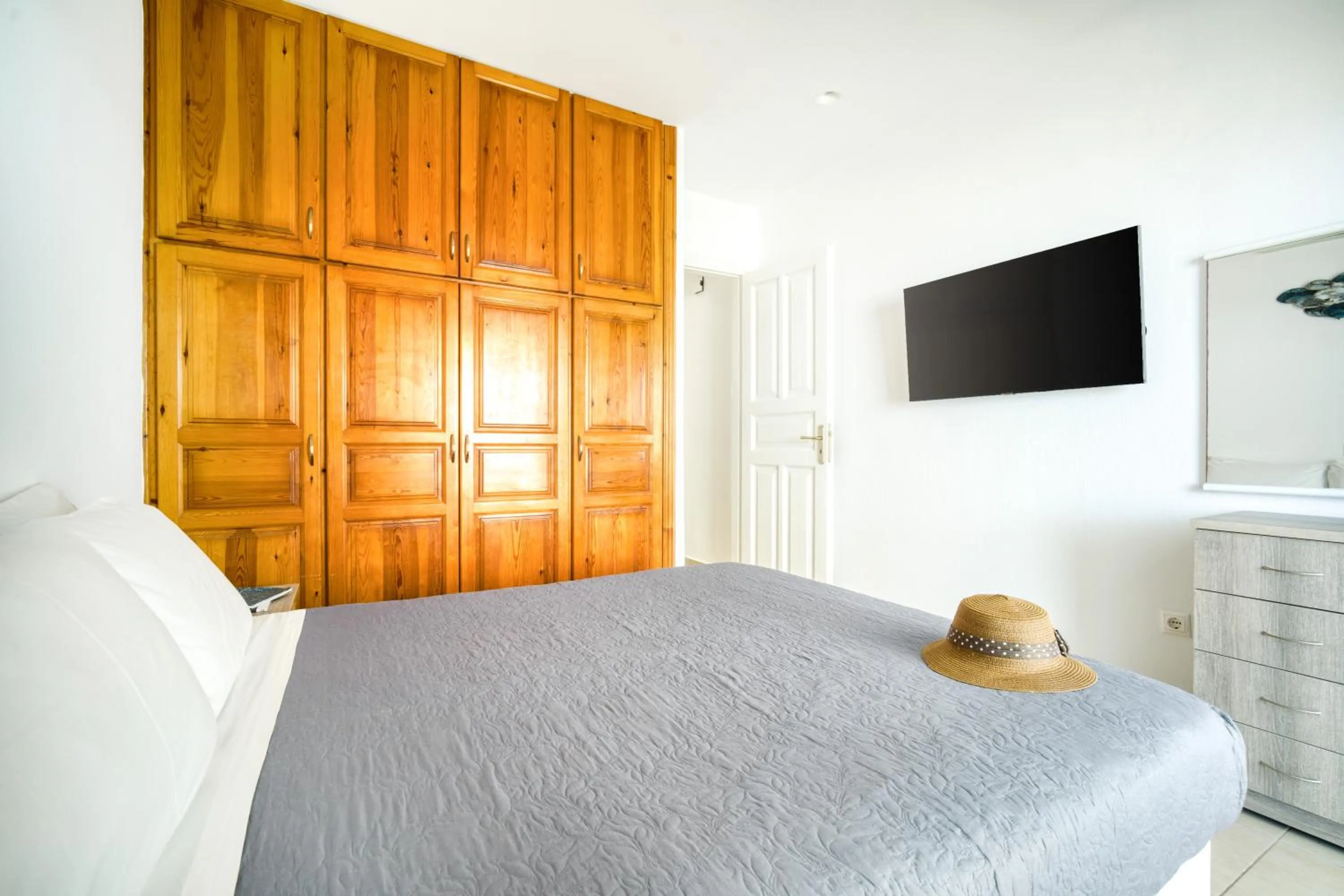 Bed in Anius Apartments
