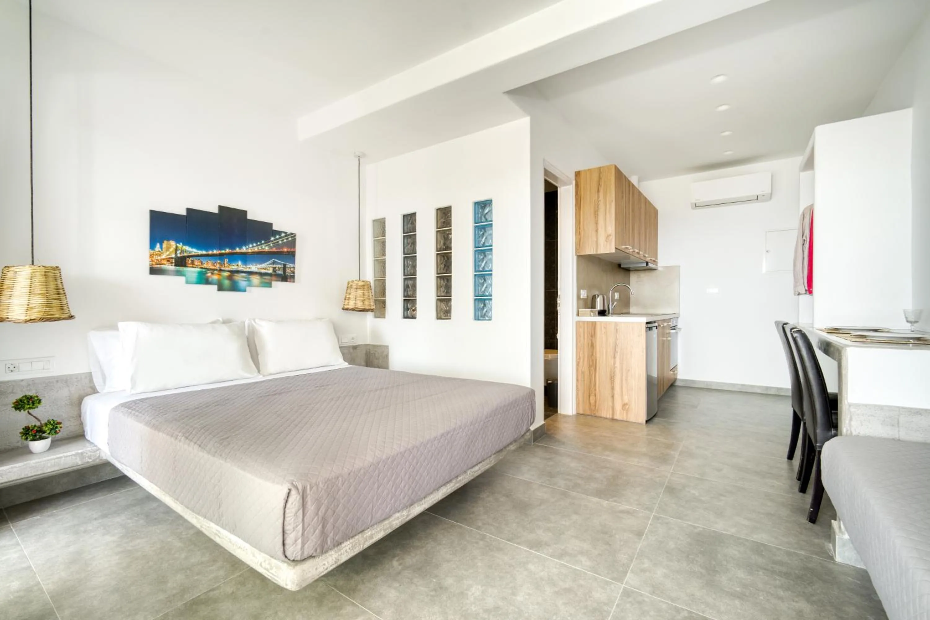 Bed in Anius Apartments