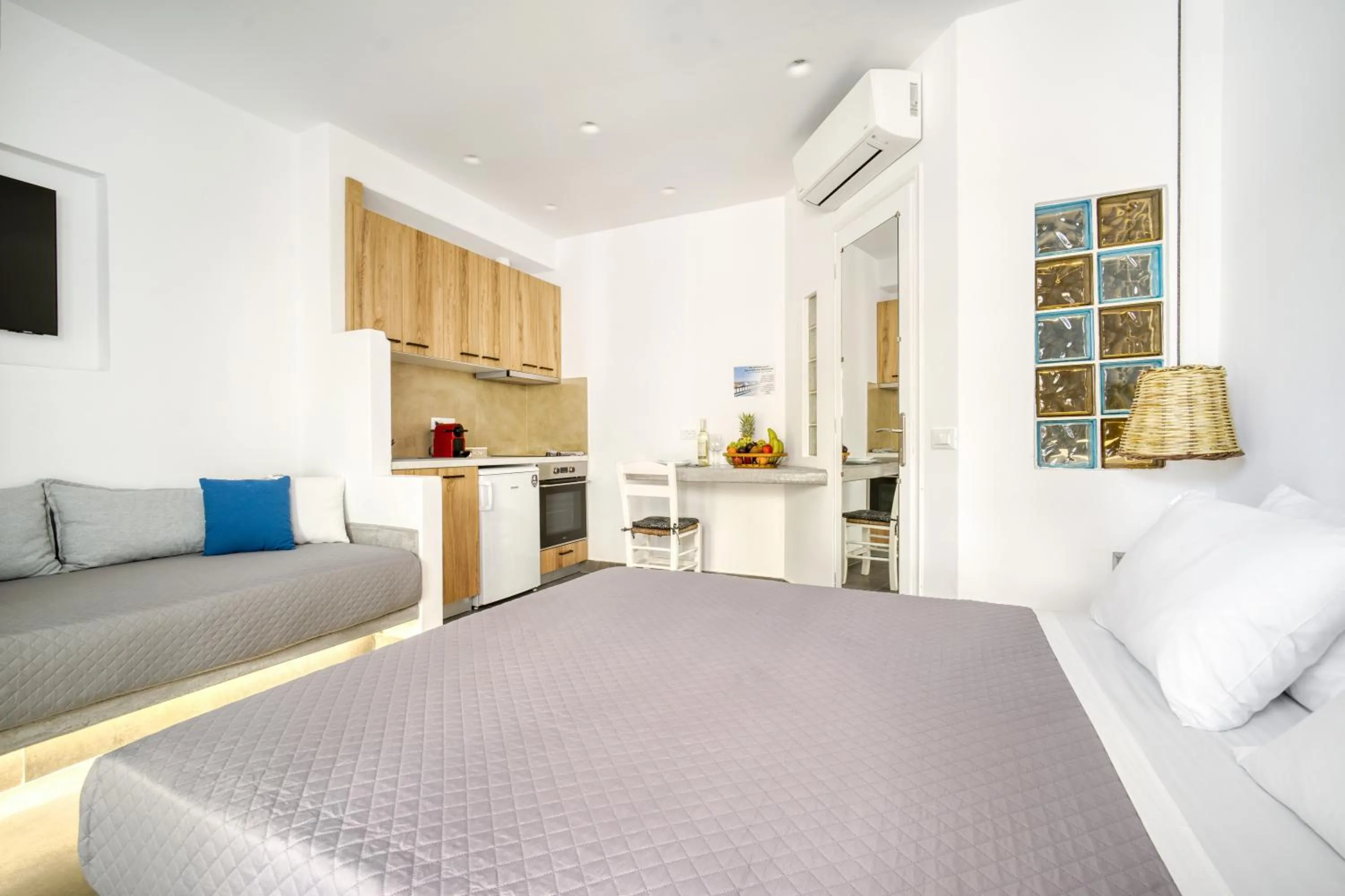 Bed in Anius Apartments