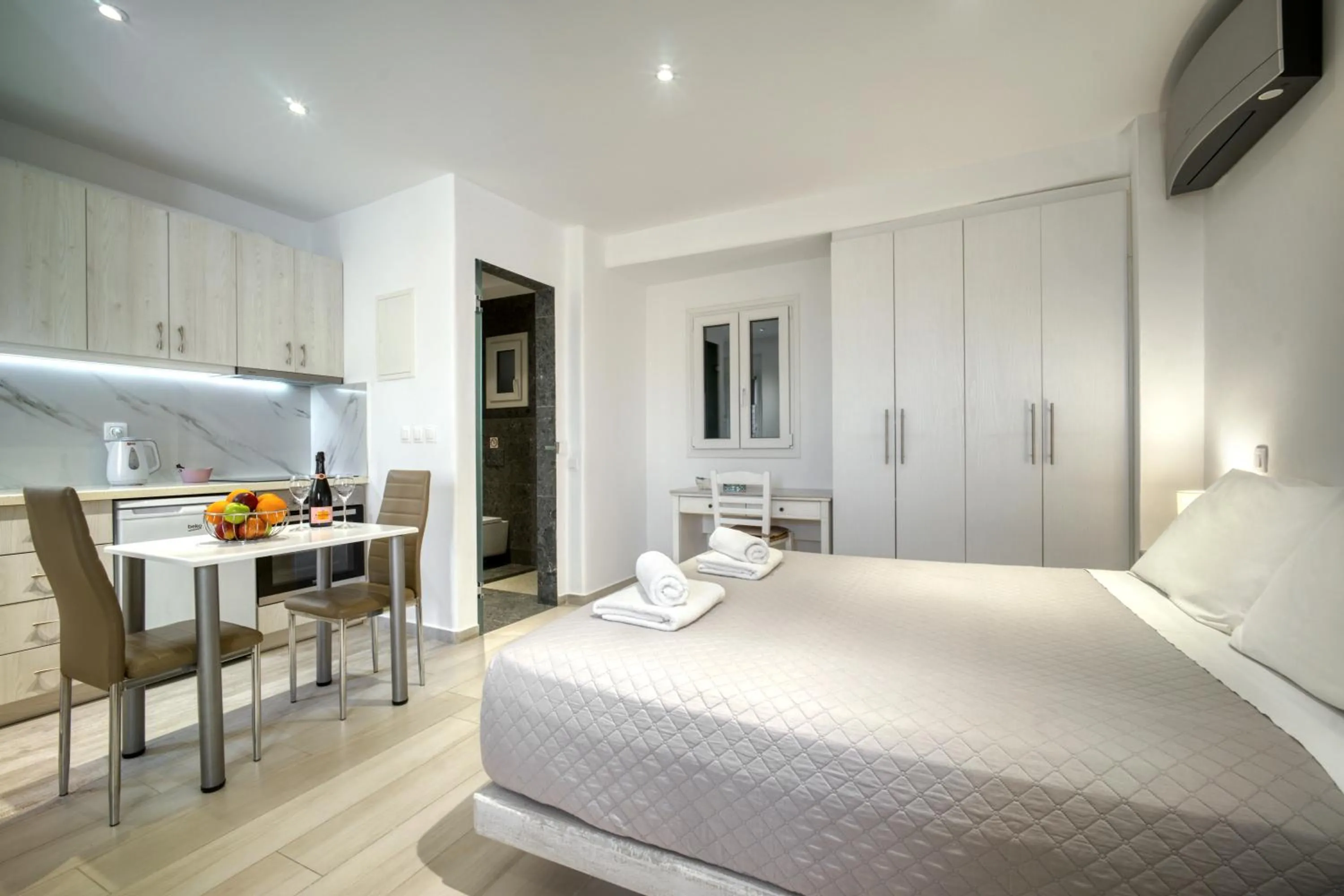 Bed in Anius Apartments