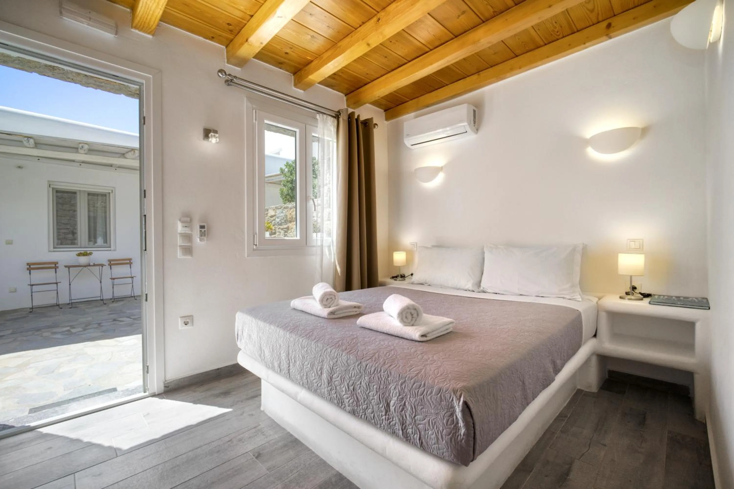 Bed in Anius Apartments