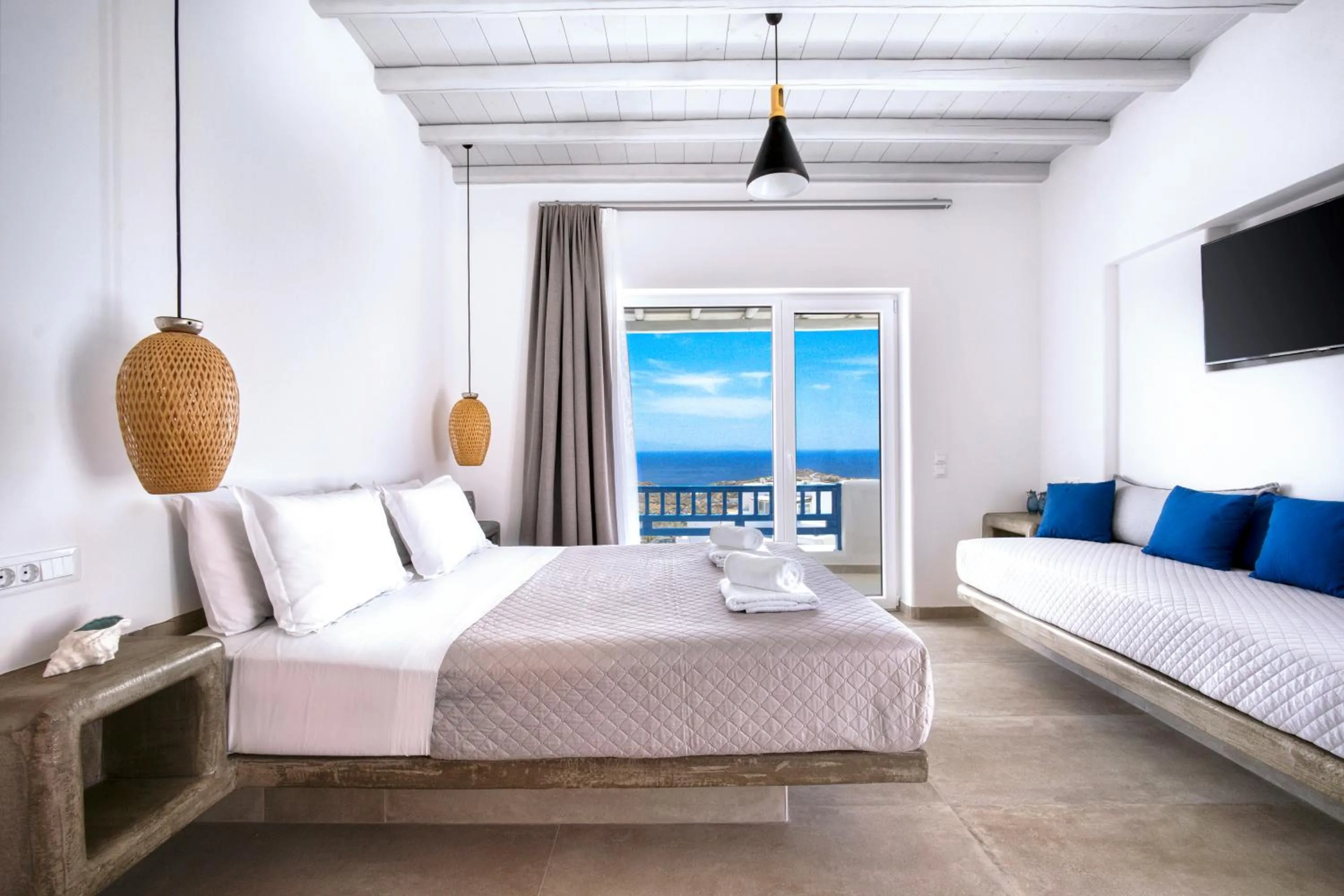 Bed in Anius Apartments